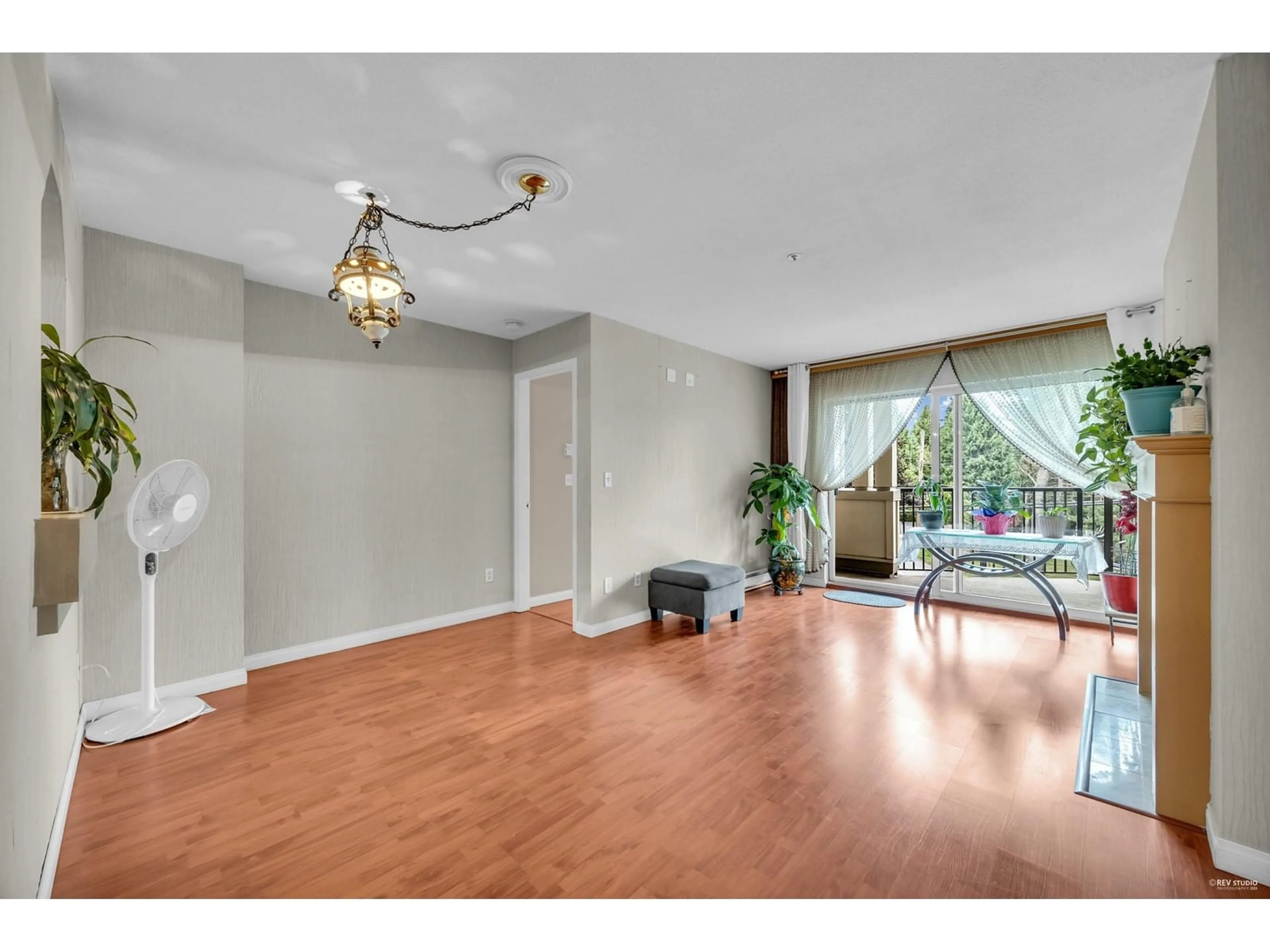 A pic of a room, wood floors for 201 20727 DOUGLAS CRESCENT, Langley British Columbia V3A4C1