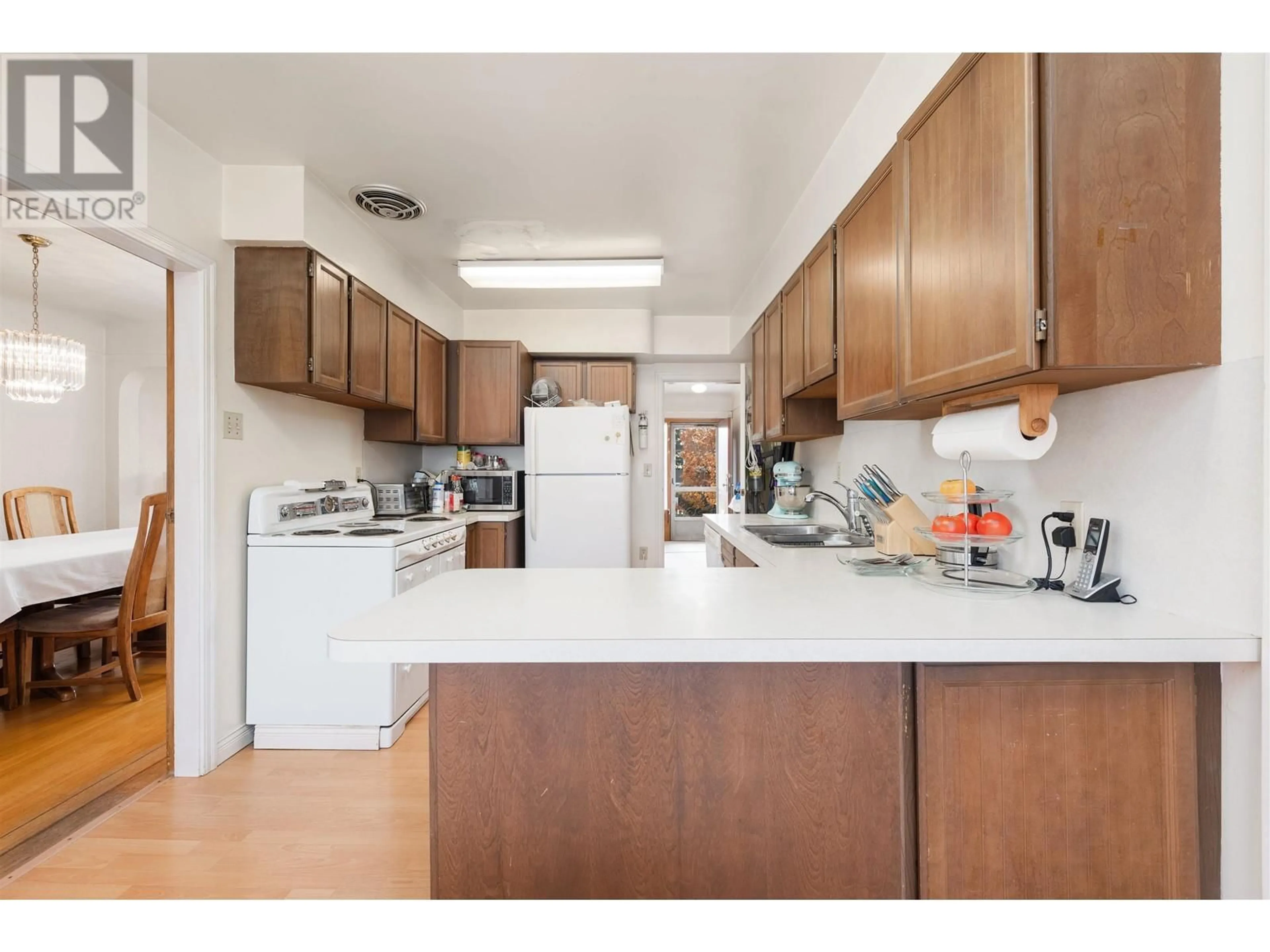 Standard kitchen, wood floors for 257 W 46TH AVENUE, Vancouver British Columbia V5Y2X2