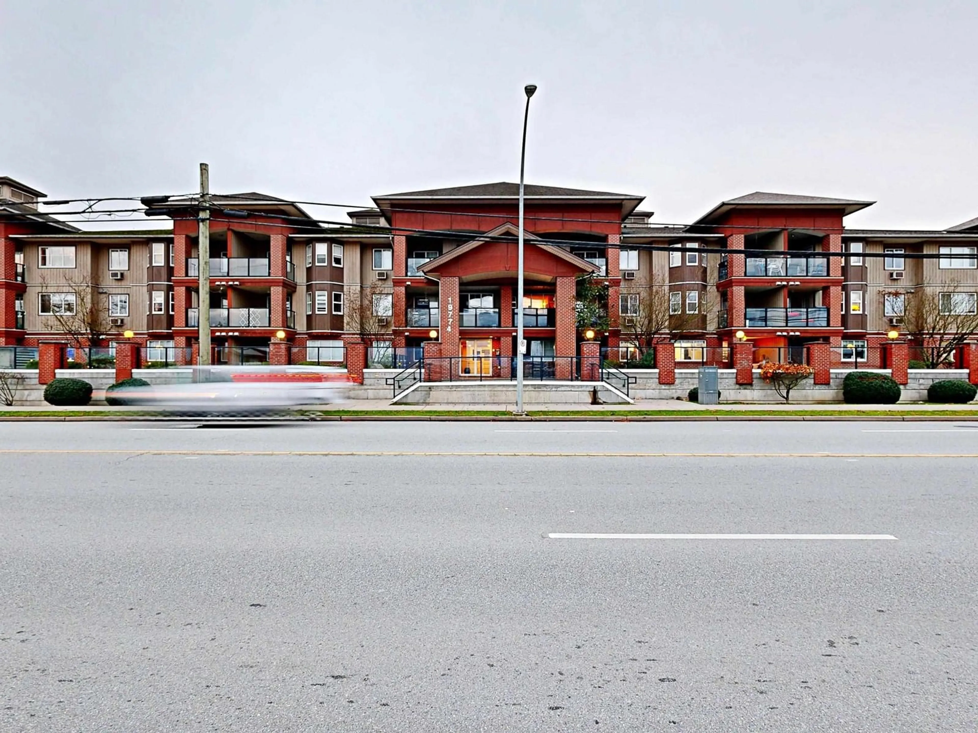 A pic from exterior of the house or condo, the front or back of building for 102 19774 56 AVENUE, Langley British Columbia V3A3X6