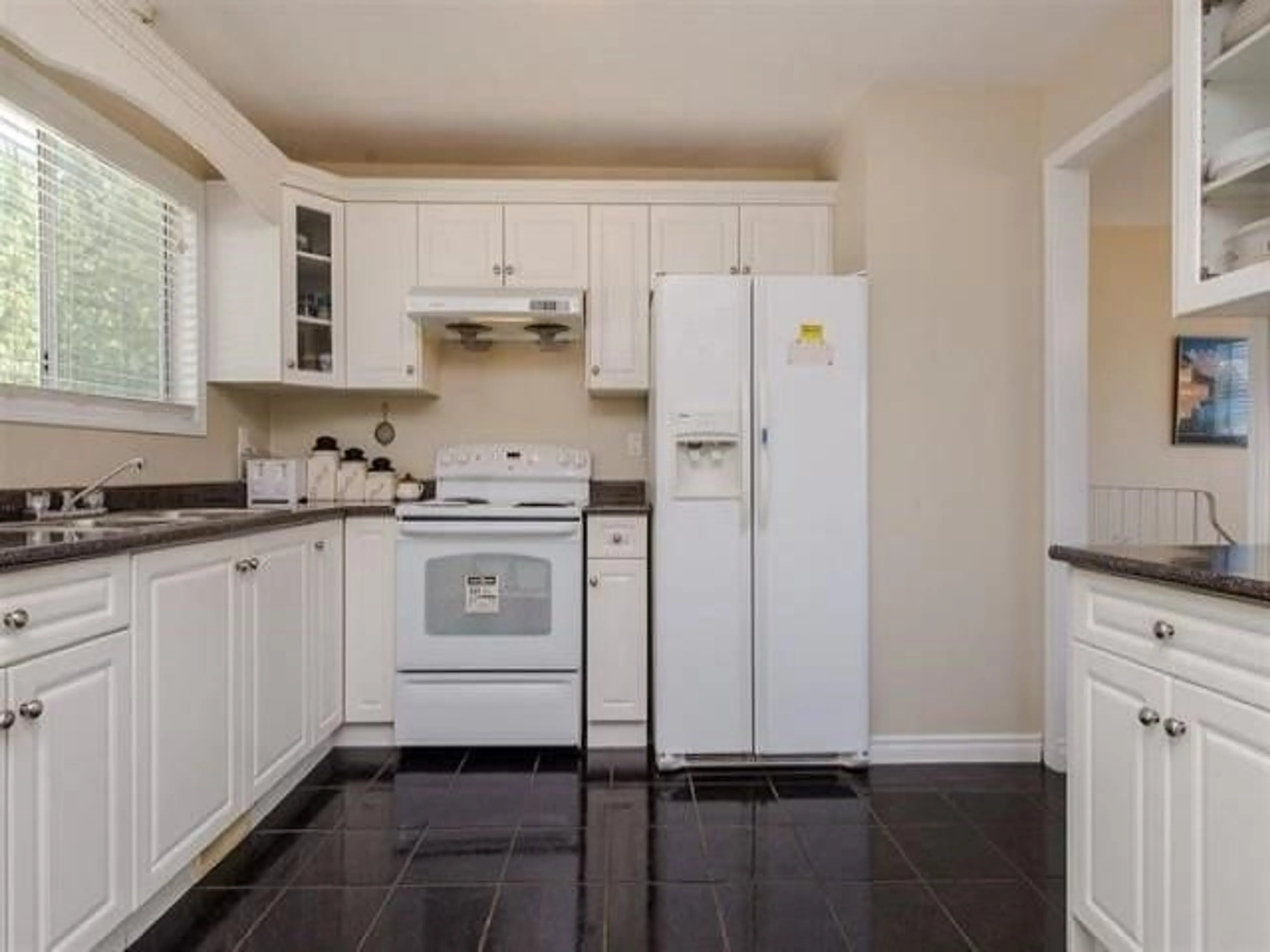 Standard kitchen, wood floors, cottage for 3316 SAANICH STREET, Abbotsford British Columbia V2T4Y9