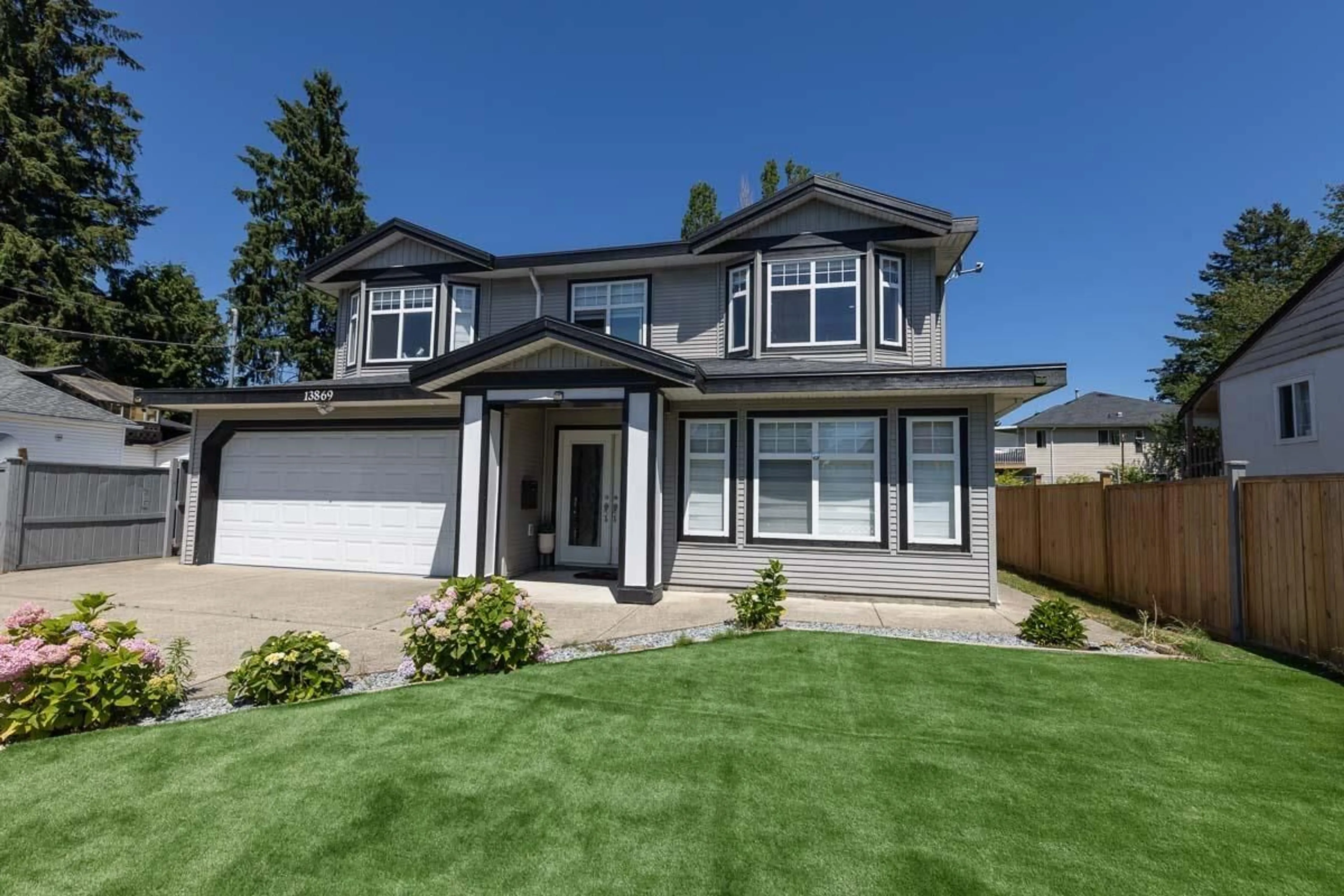 Home with vinyl exterior material, street for 13869 BRENTWOOD CRESCENT, Surrey British Columbia V3R5M1