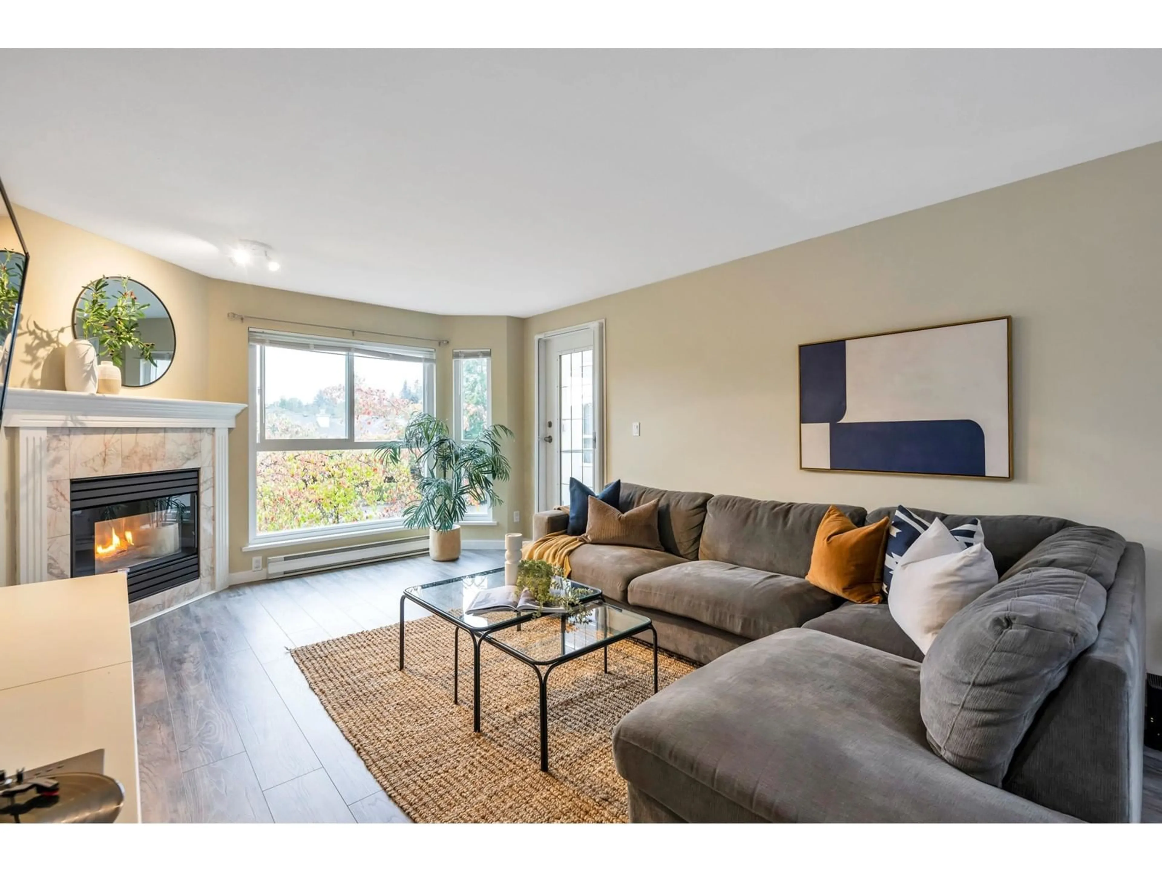 Living room, wood floors for 203 19835 64 AVENUE, Langley British Columbia V2Y1L8