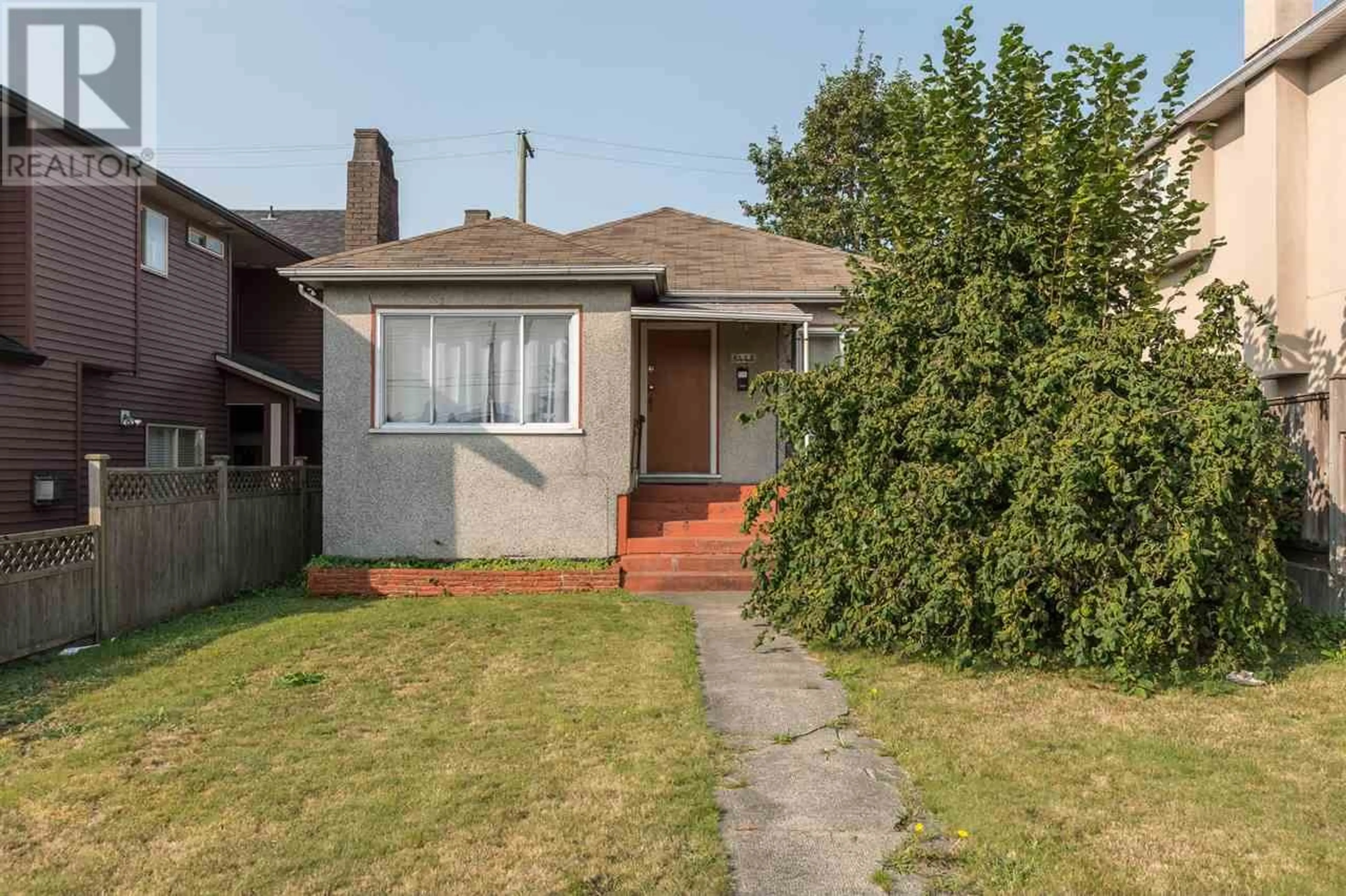 Frontside or backside of a home, cottage for 8443 OAK STREET, Vancouver British Columbia V6P4A9