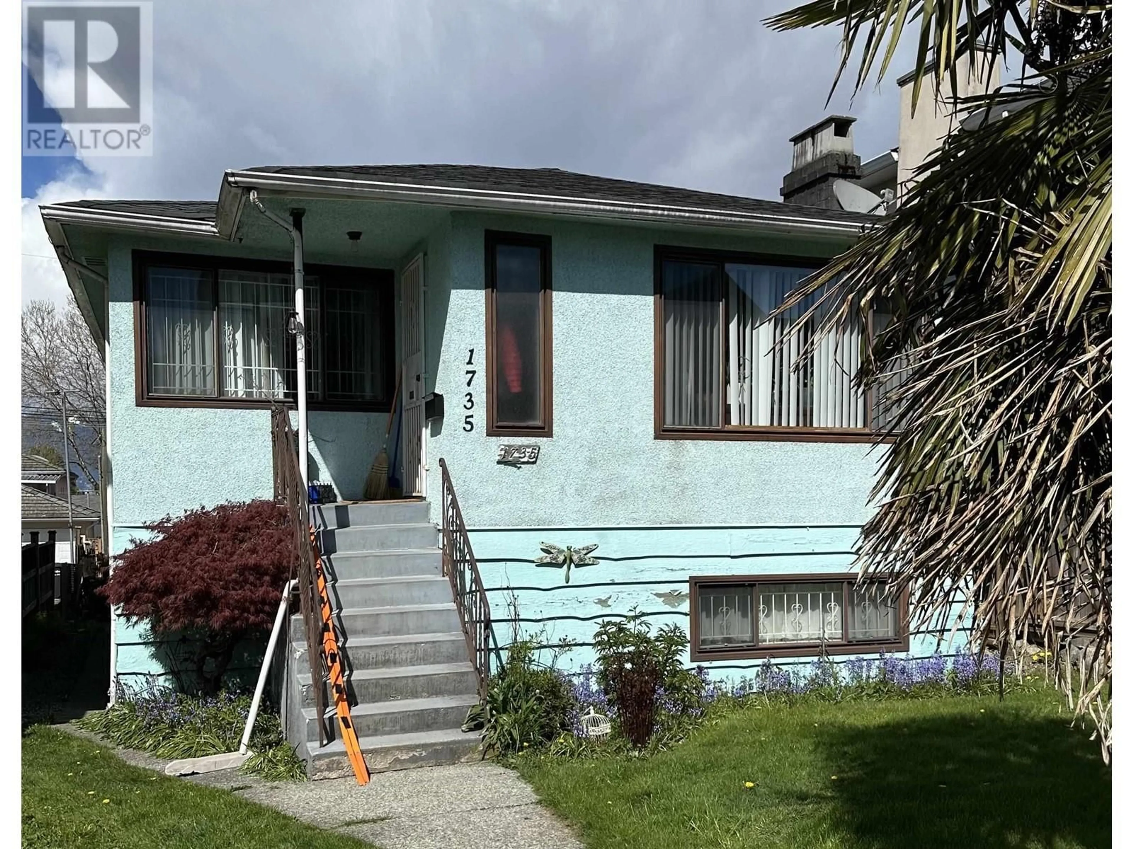 Frontside or backside of a home, the street view for 1735 E 35TH AVENUE, Vancouver British Columbia V5P1B5