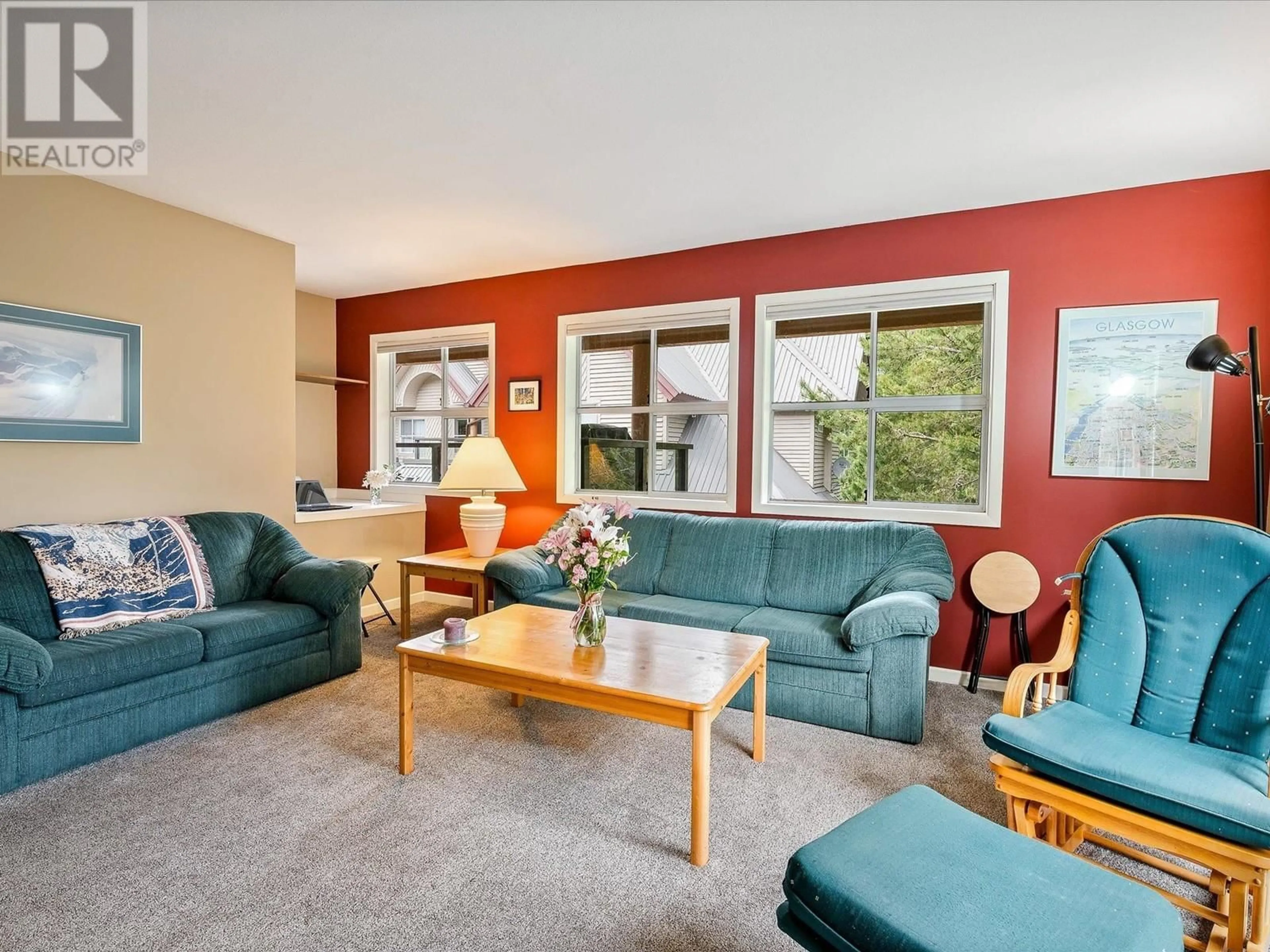 Living room, wood floors for 112 2222 CASTLE DRIVE, Whistler British Columbia V8E0L7