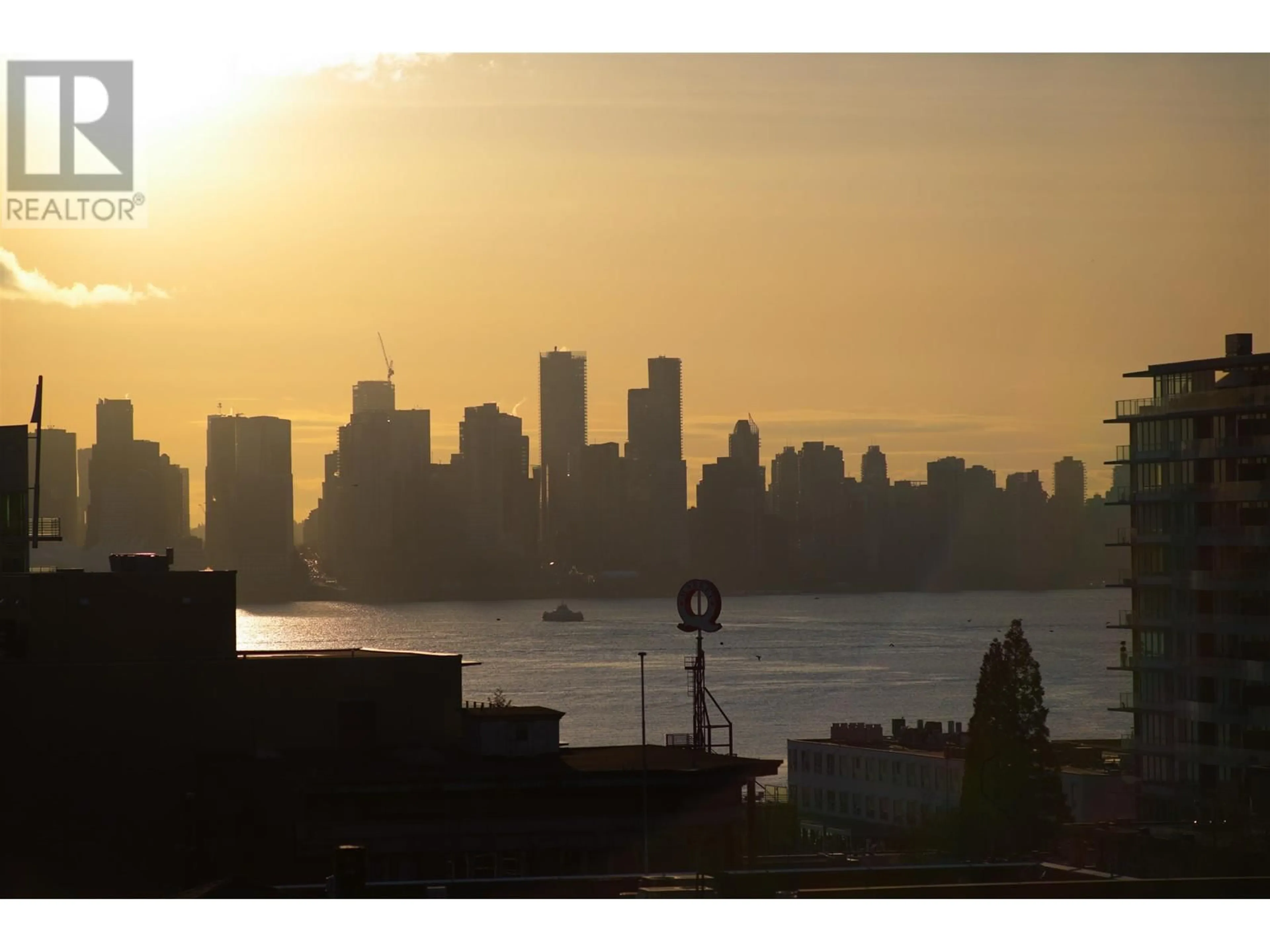 A pic from exterior of the house or condo, the view of city buildings for 403 118 E 2ND STREET, North Vancouver British Columbia V7L1C3