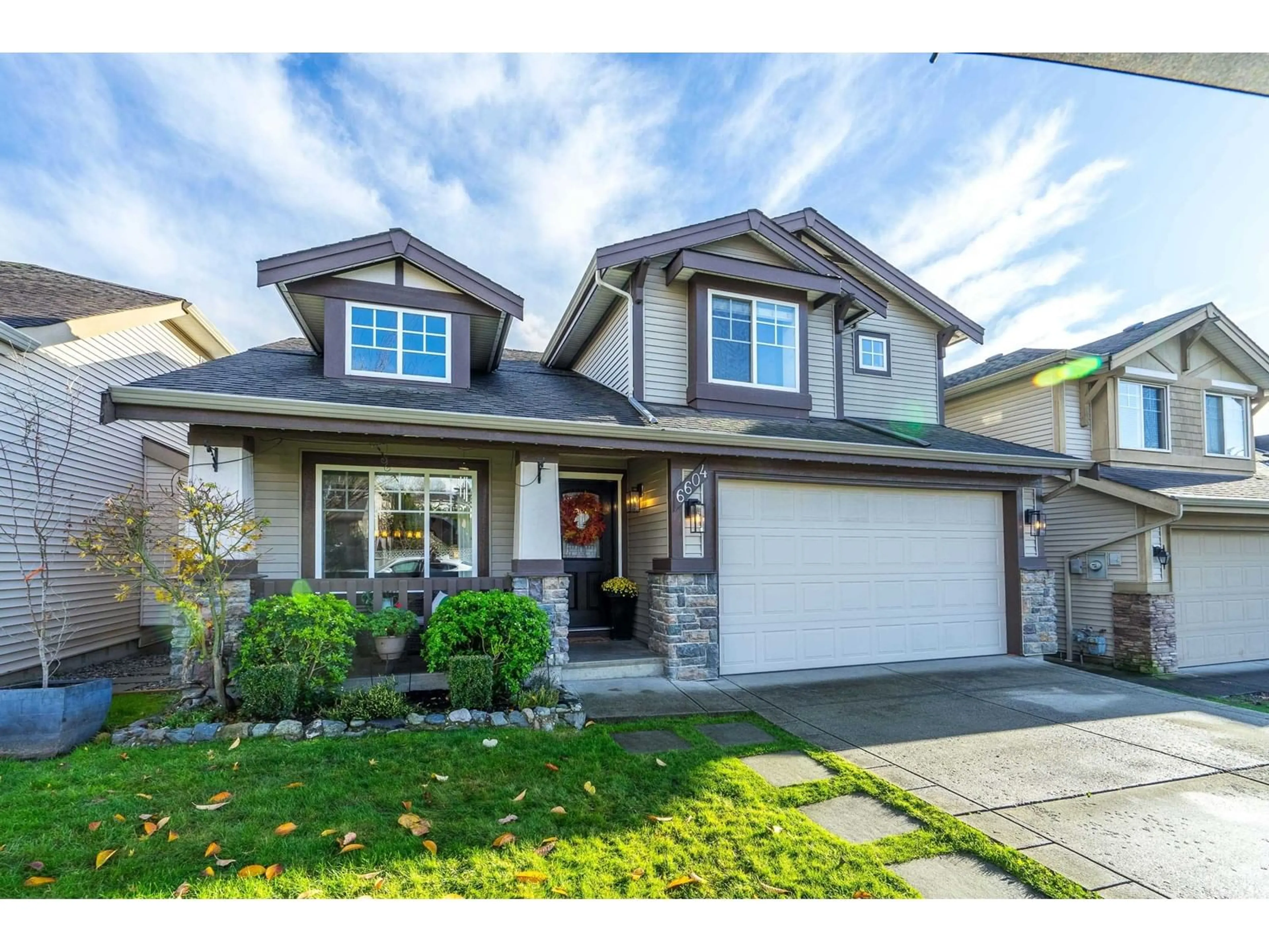 Frontside or backside of a home, the street view for 6604 207 STREET, Langley British Columbia V2Y2Y5