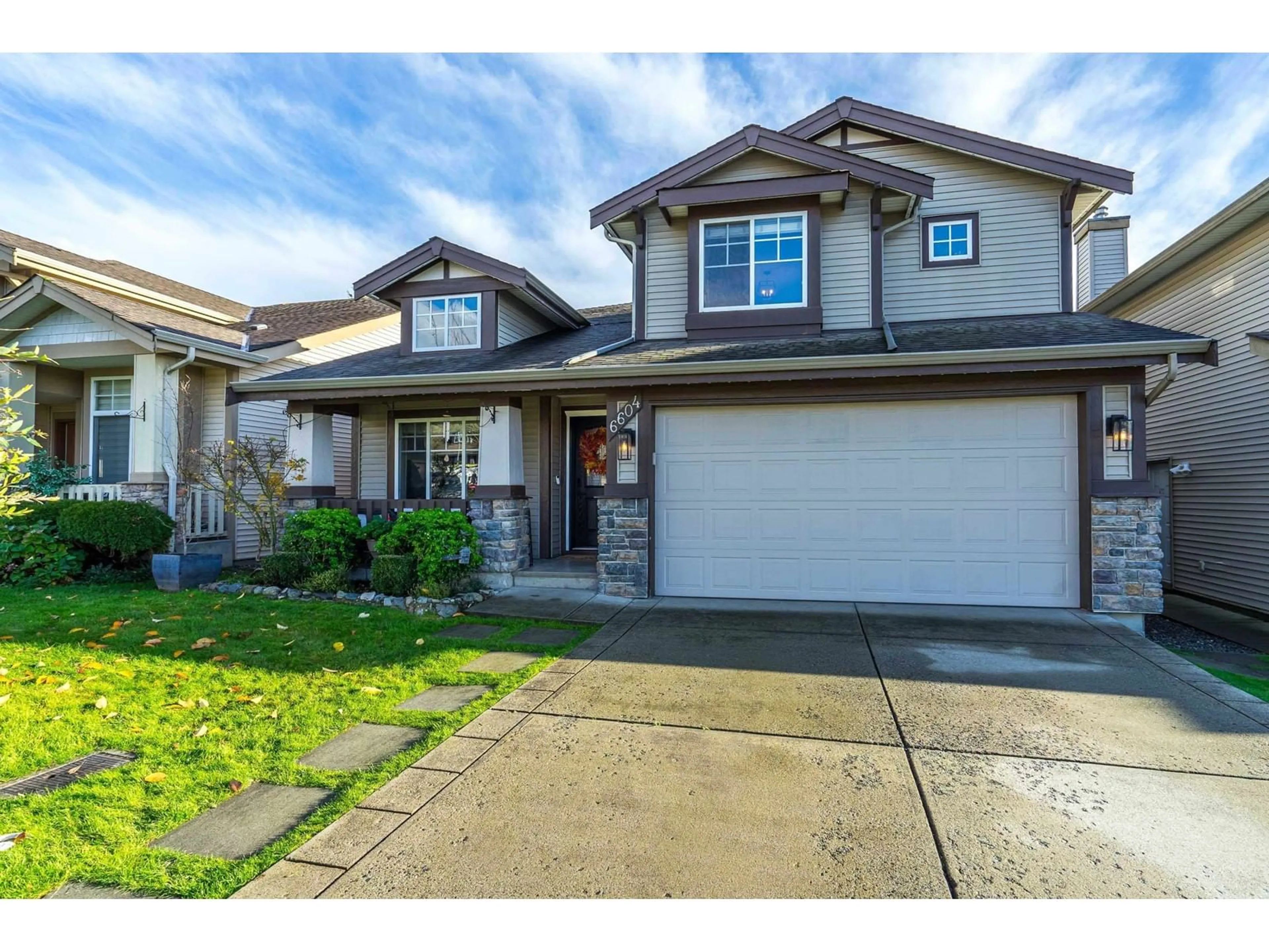 Frontside or backside of a home, the street view for 6604 207 STREET, Langley British Columbia V2Y2Y5