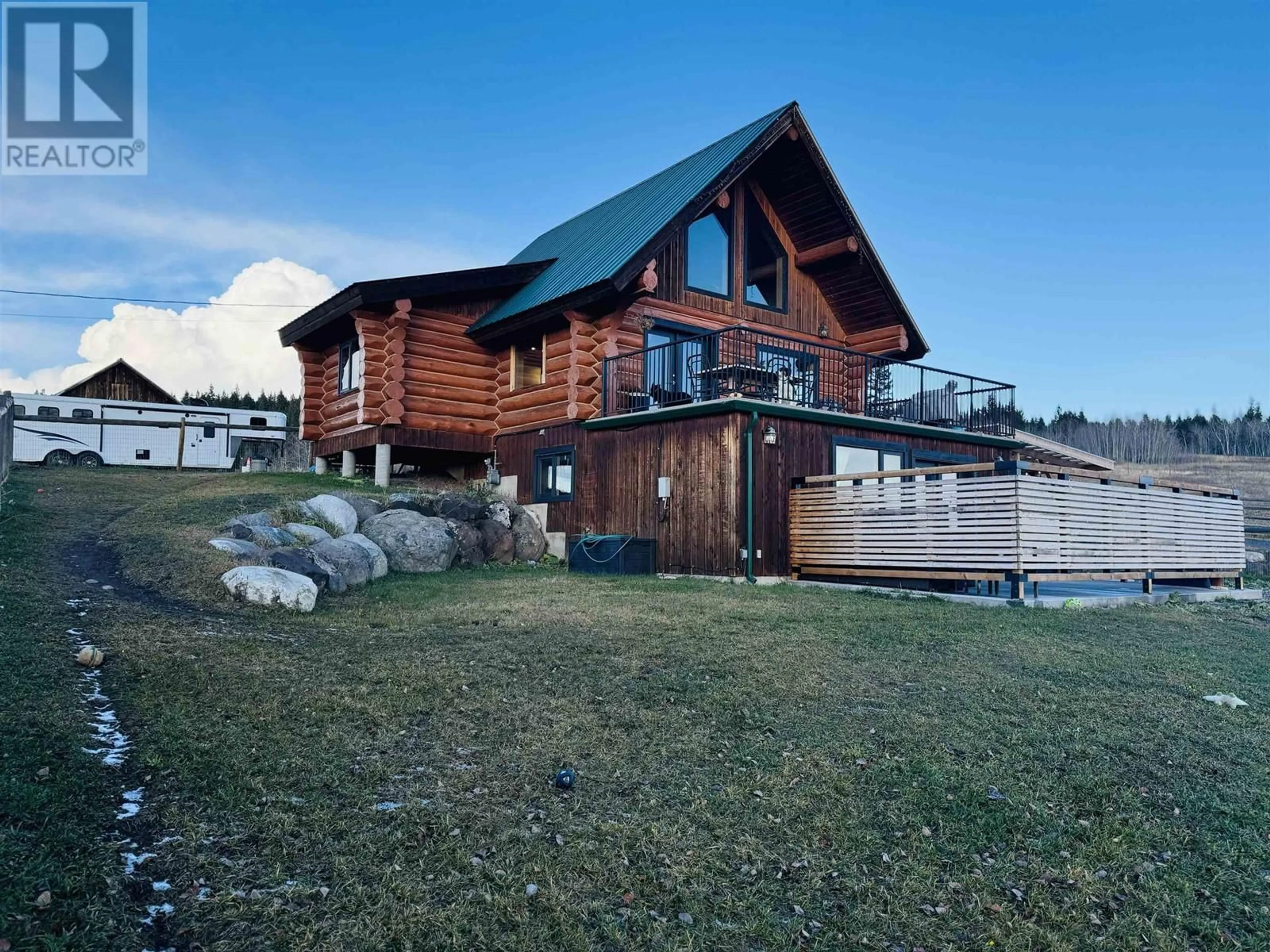 Frontside or backside of a home, cottage for 3877 CARIBOO 97 HIGHWAY, Lac La Hache British Columbia V0K1K0