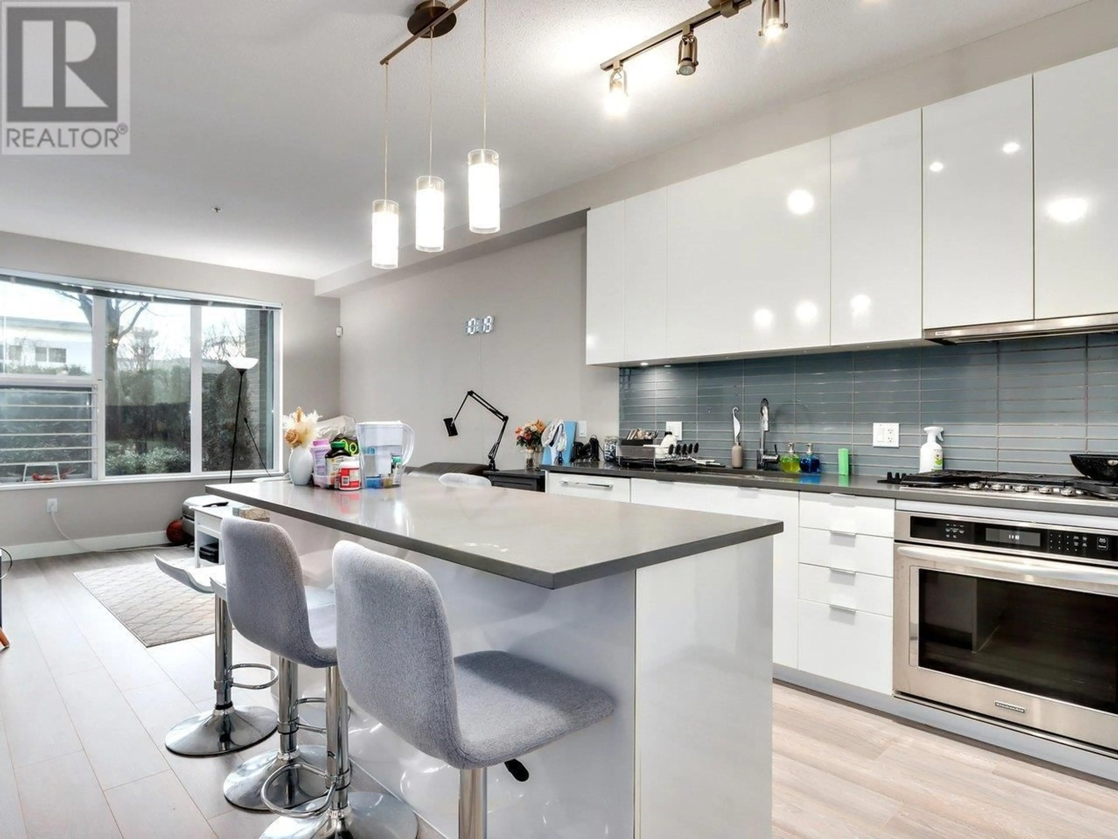 Contemporary kitchen, wood floors for 115 9399 ALEXANDRA ROAD, Richmond British Columbia V6X0L7