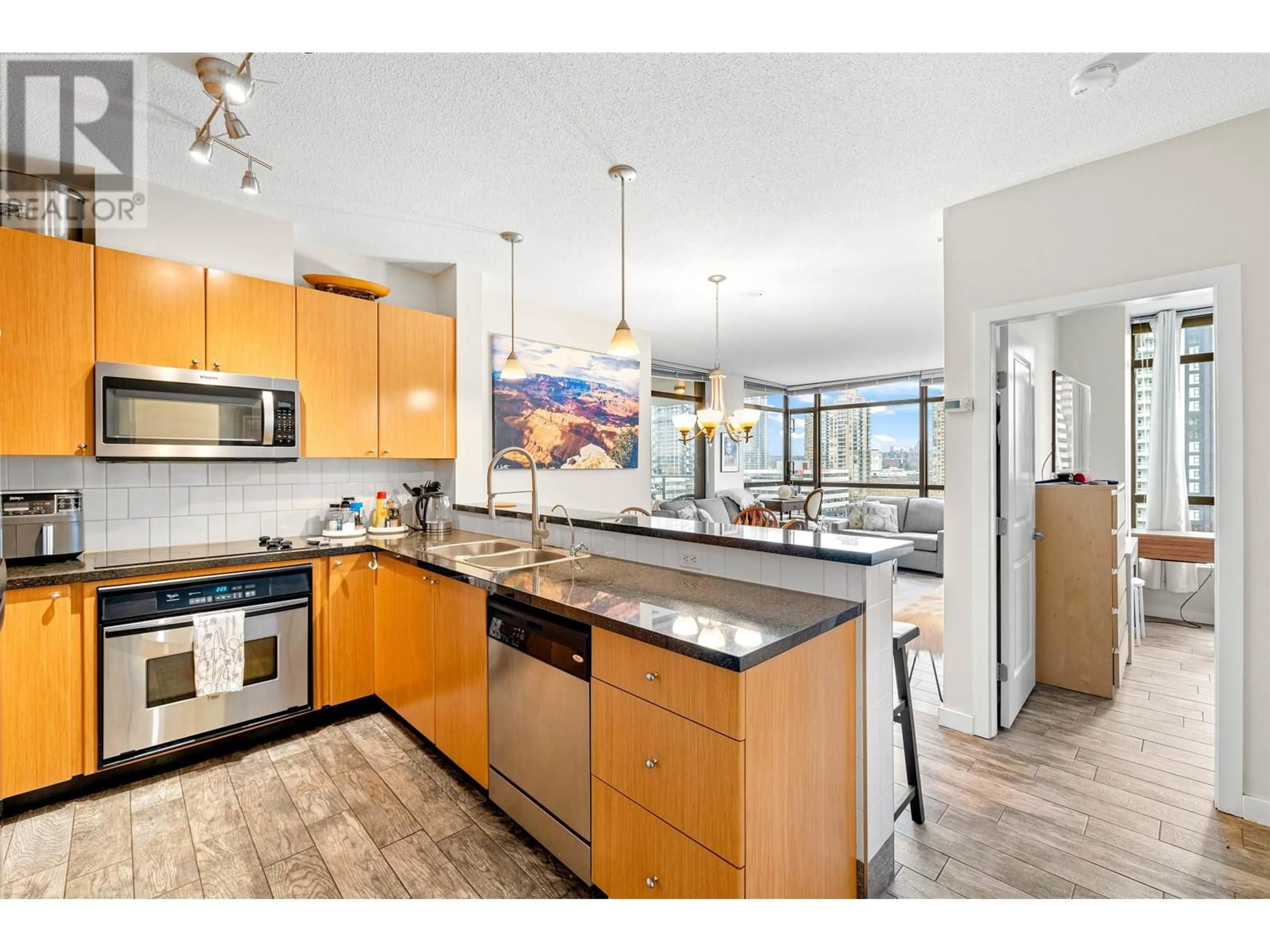 Open concept kitchen for 706 4132 HALIFAX STREET, Burnaby British Columbia V5C6V1