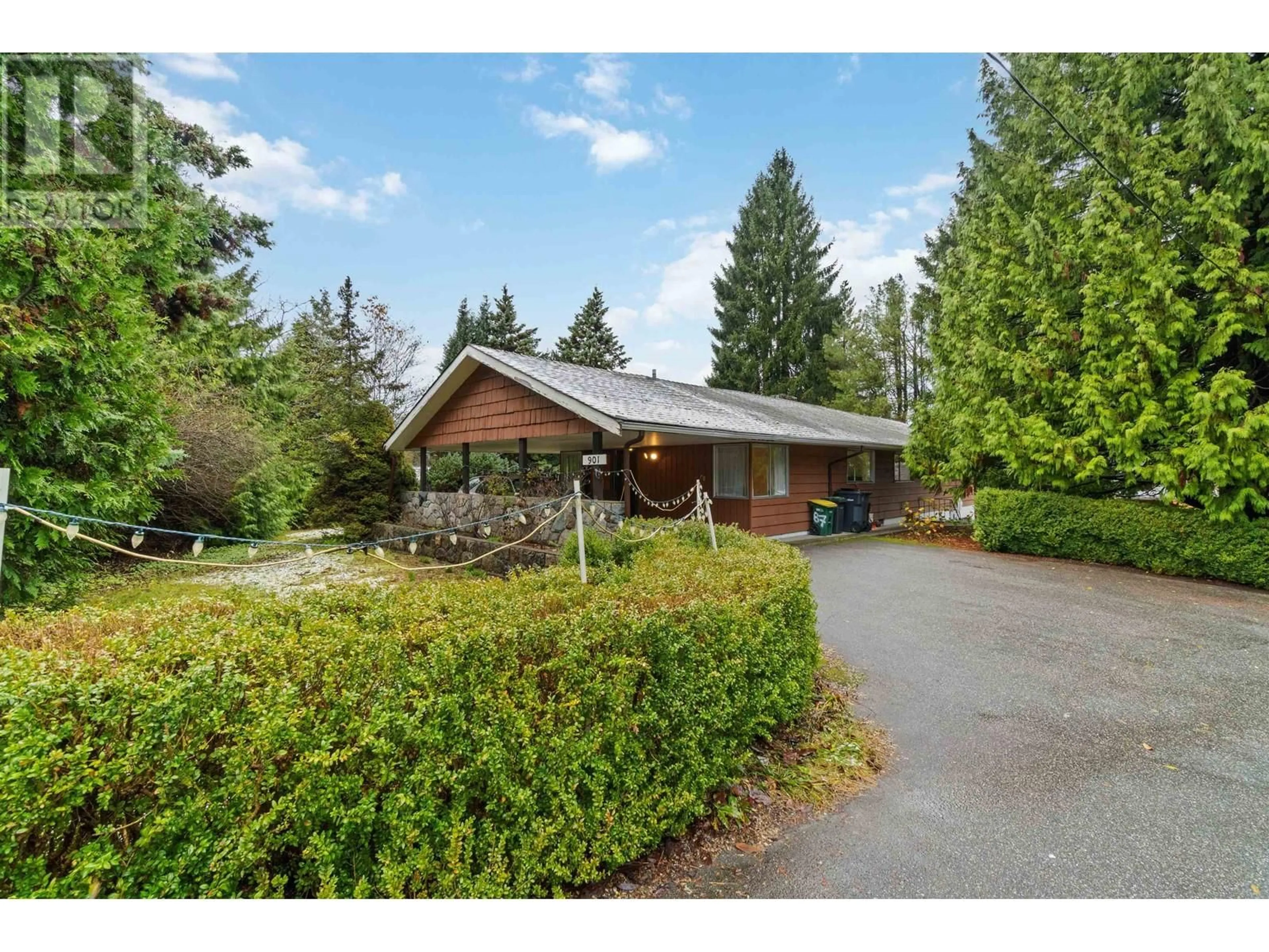 Frontside or backside of a home, cottage for 901 COMO LAKE AVENUE, Coquitlam British Columbia V3J3N2