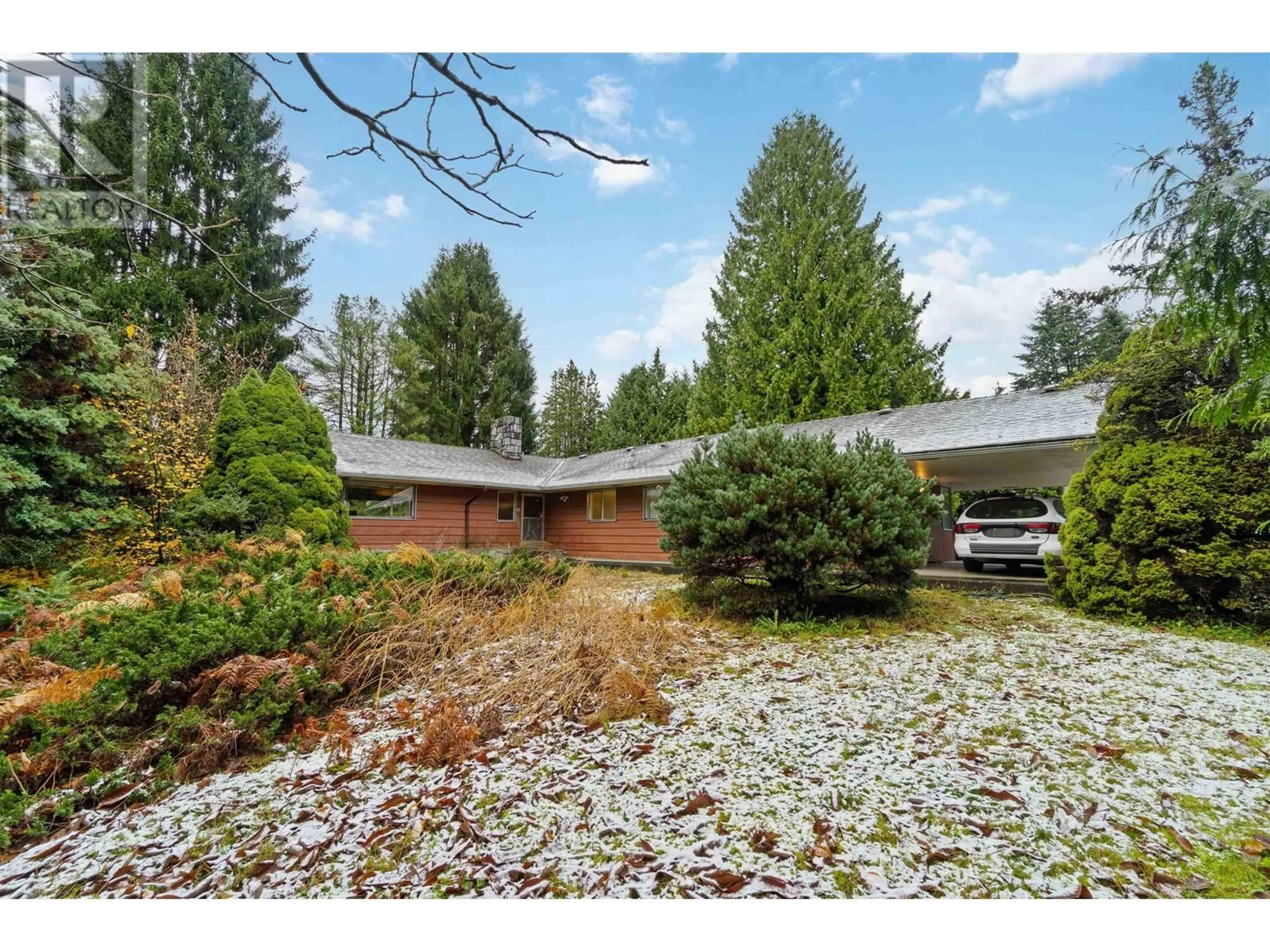 A pic from exterior of the house or condo, the fenced backyard for 901 COMO LAKE AVENUE, Coquitlam British Columbia V3J3N2