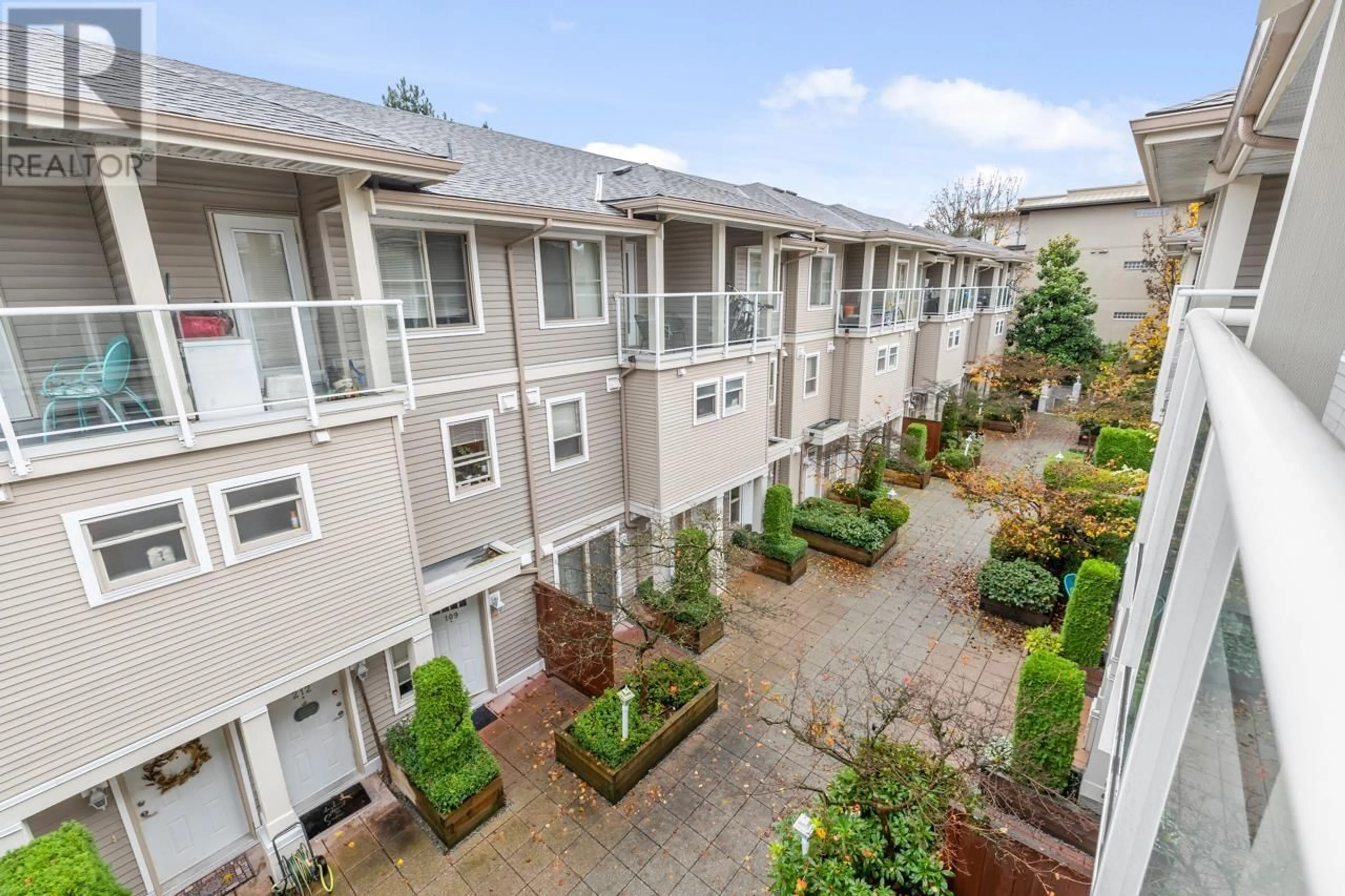 A pic from exterior of the house or condo, the fenced backyard for 208 2432 WELCHER AVENUE, Port Coquitlam British Columbia V3C1X7