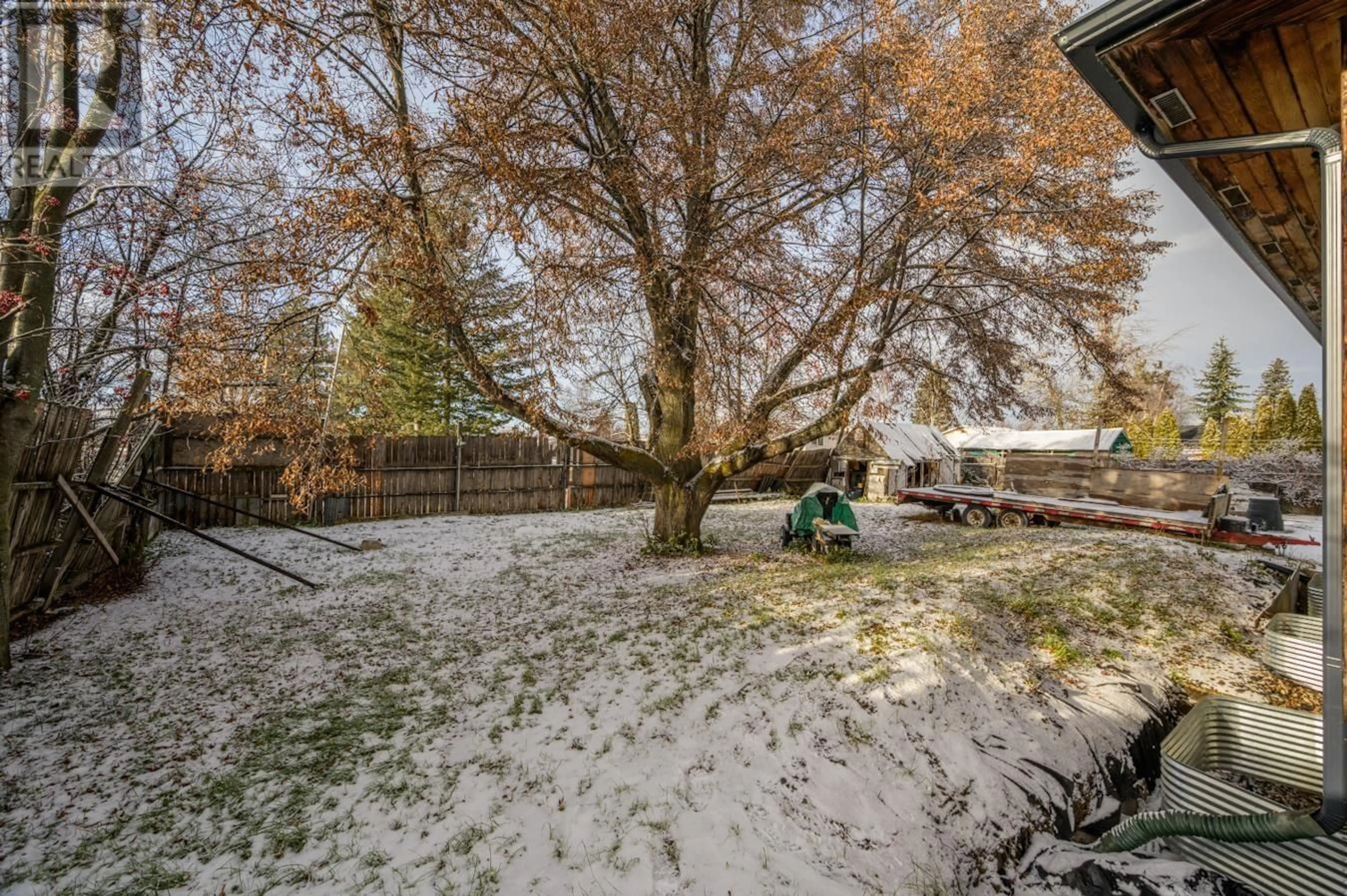 Patio, the fenced backyard for 2221 SPRUCE STREET, Prince George British Columbia V2L2R7