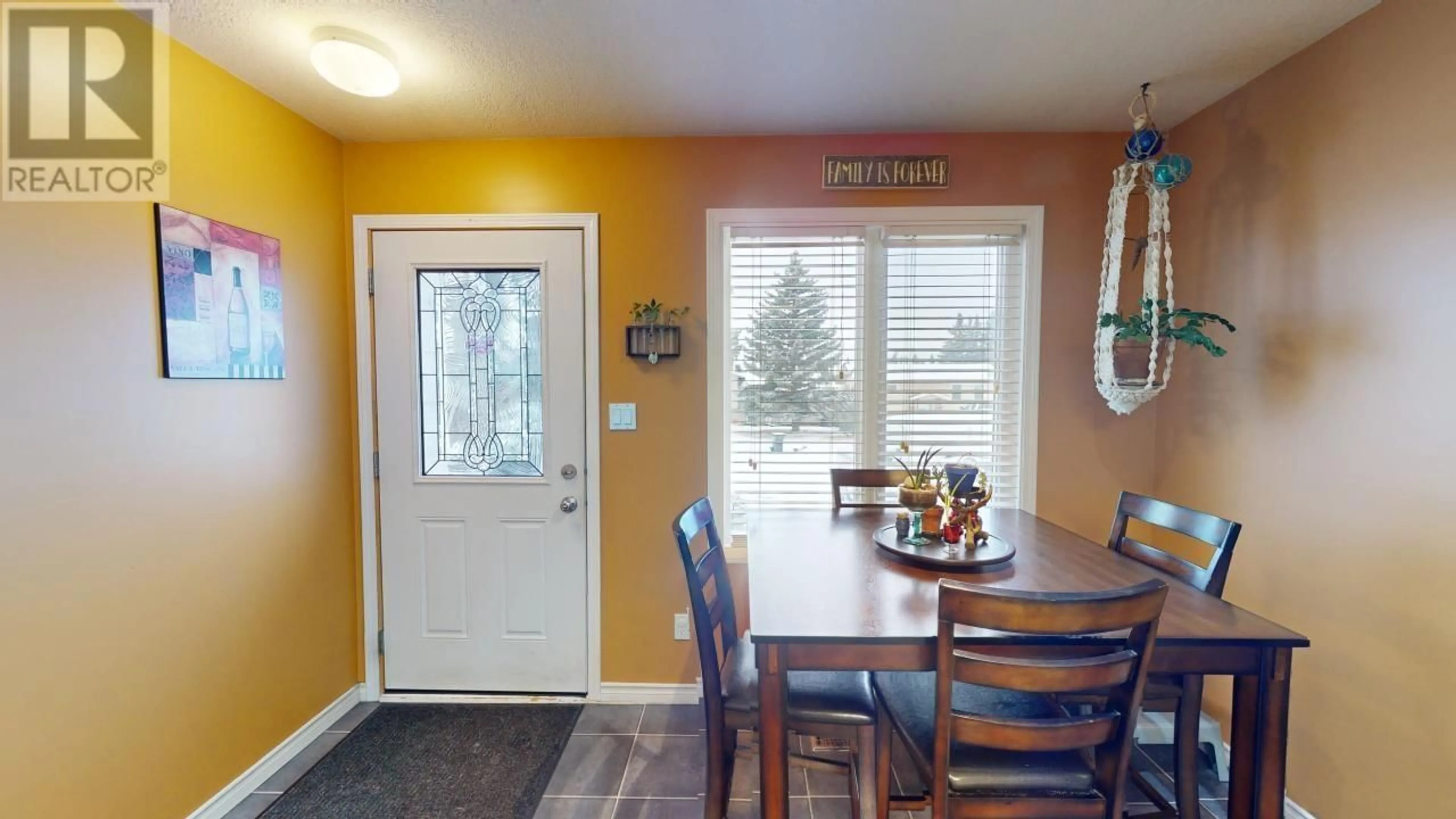 Dining room, wood floors, cottage for 8711 88 STREET, Fort St. John British Columbia V1J5A3