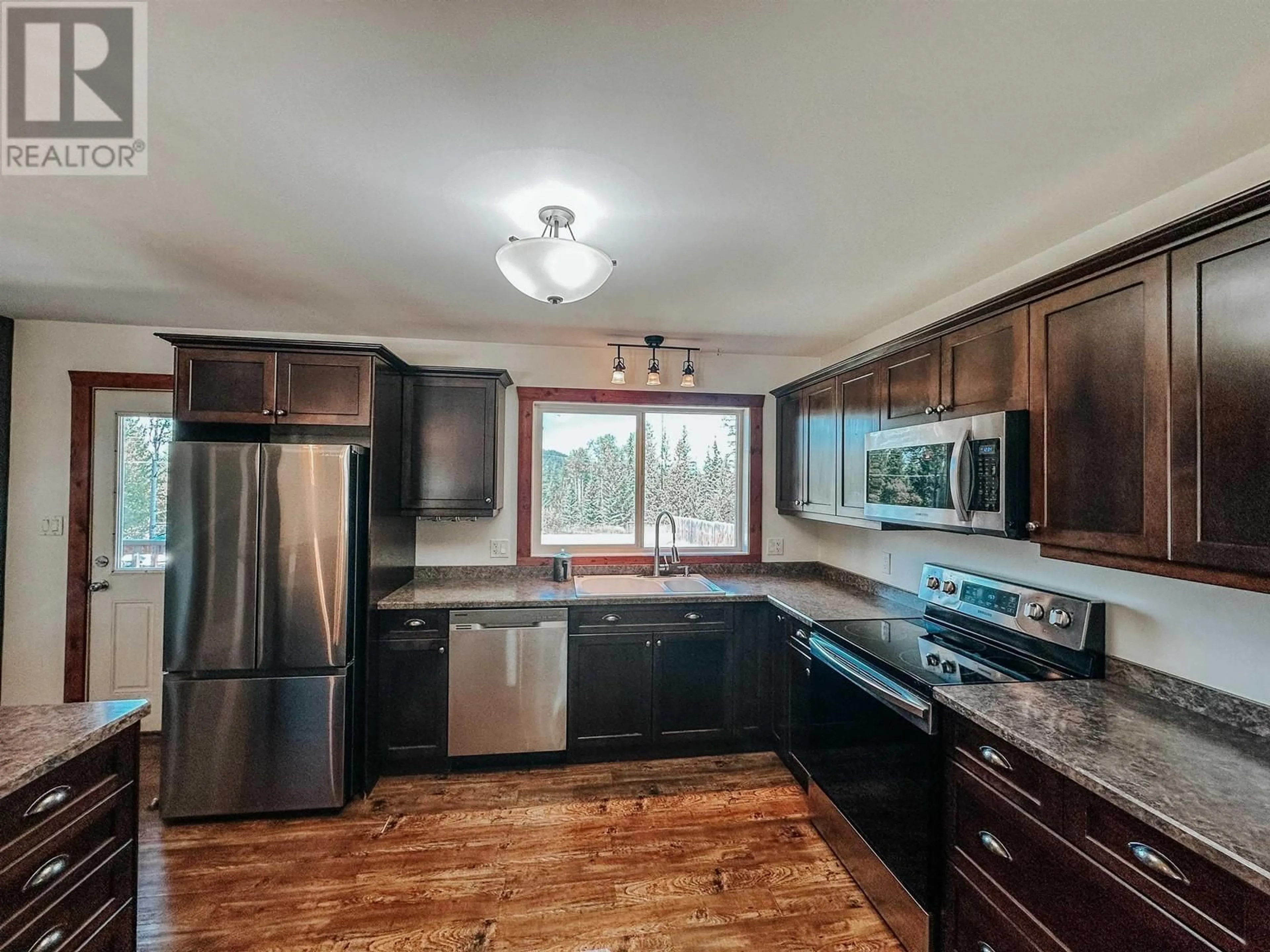 Open concept kitchen for 7604 WOMACK ROAD, Deka Lake / Sulphurous / Hathaway Lakes British Columbia V0K1X3