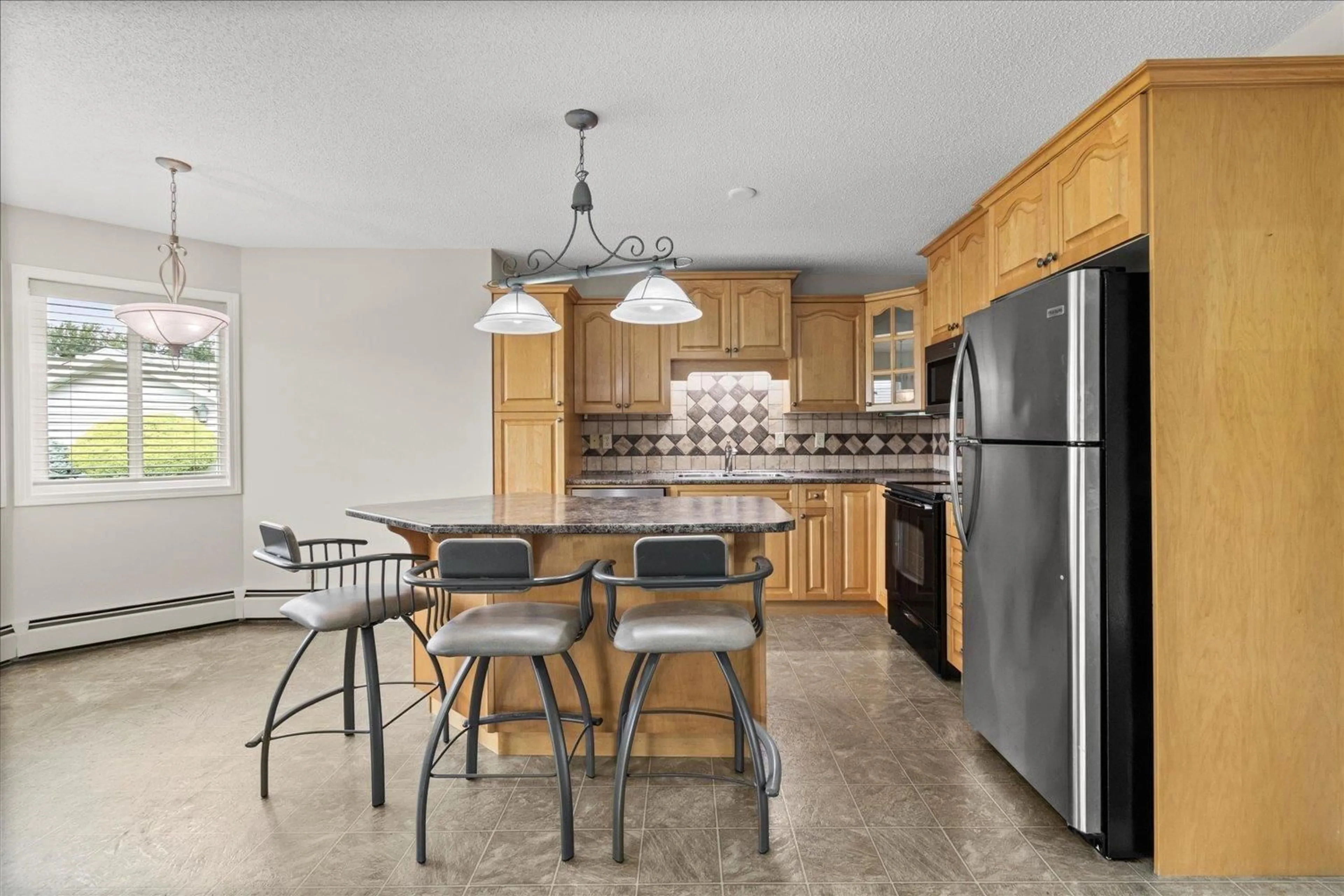 Open concept kitchen for 6971 WILTSHIRE STREET, Chilliwack British Columbia V2R2S9