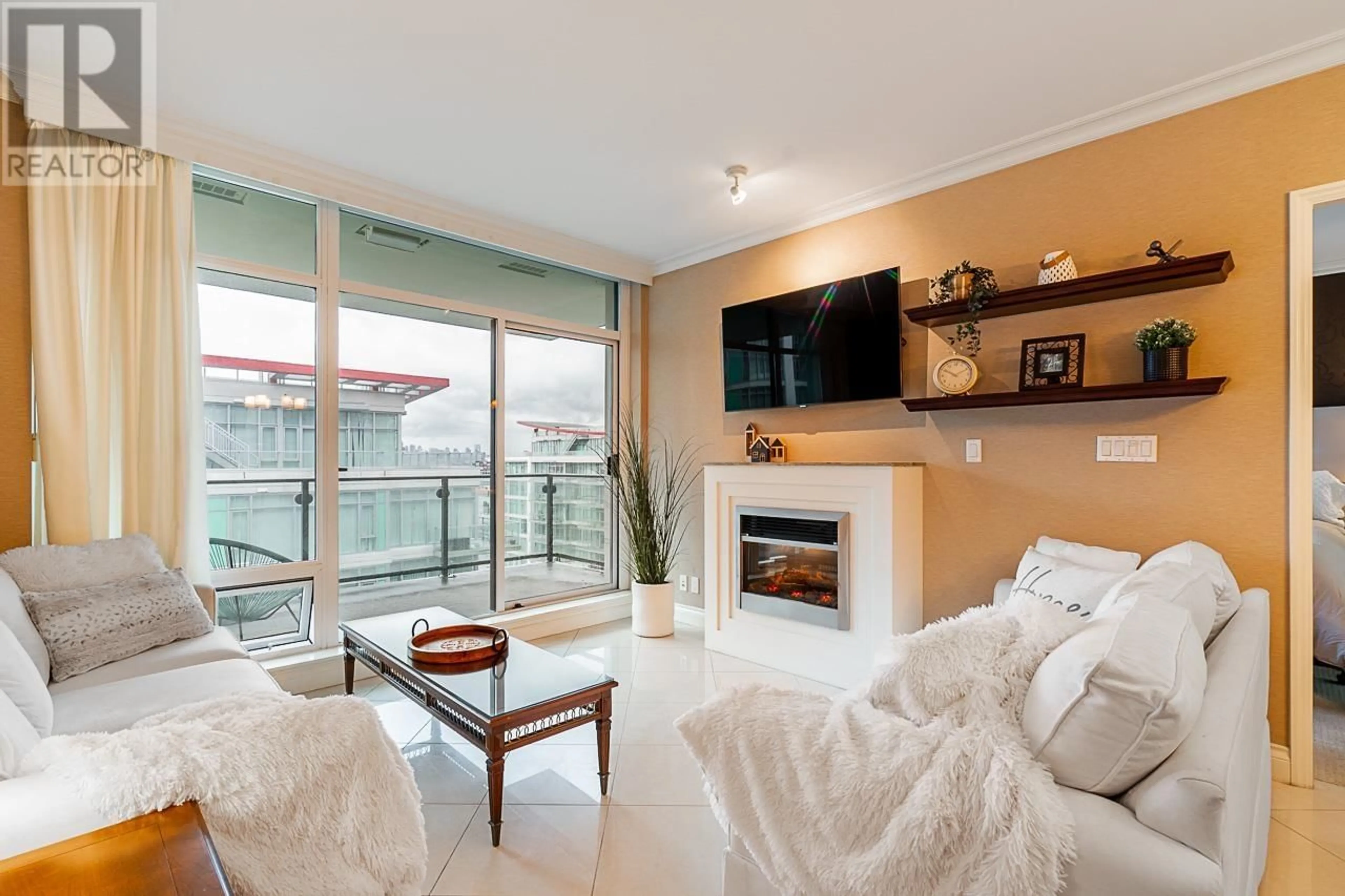 Living room, wood floors for 905 172 VICTORY SHIP WAY, North Vancouver British Columbia V7L0B5