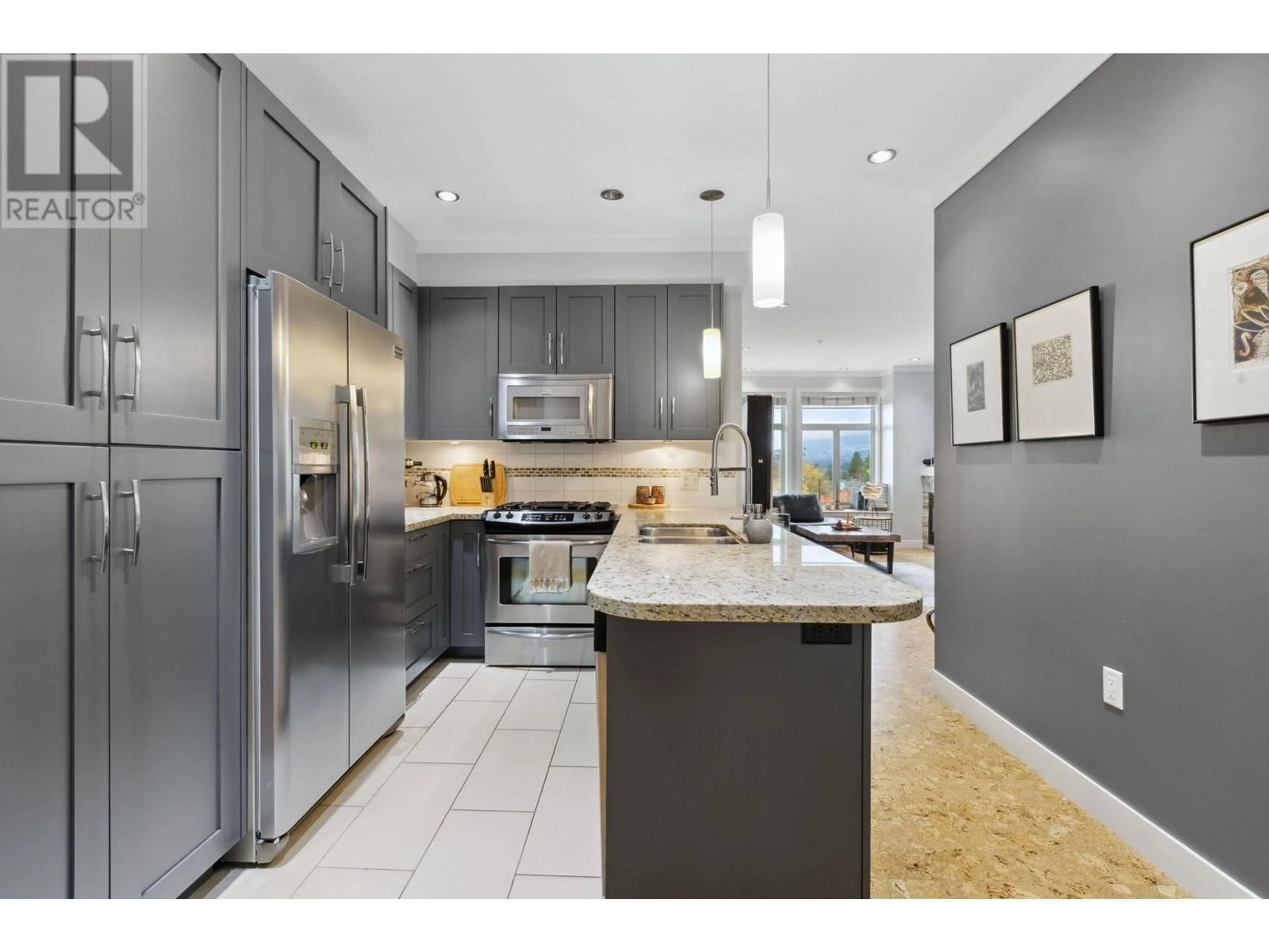 Open concept kitchen for 302 116 W 23RD STREET, North Vancouver British Columbia V7M2A9