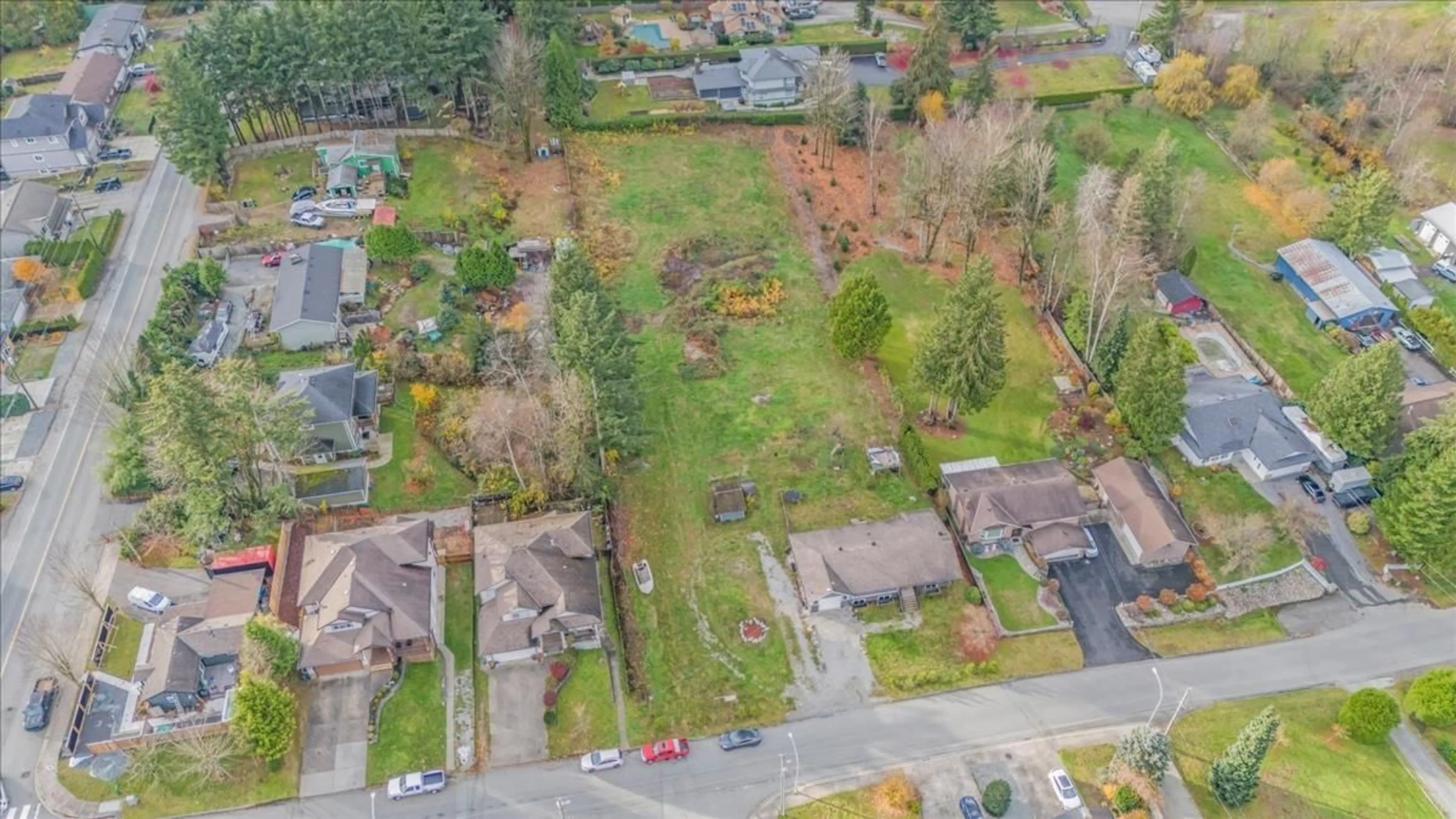 Frontside or backside of a home, the fenced backyard for 8443 HARMS STREET, Mission British Columbia V2V6E2