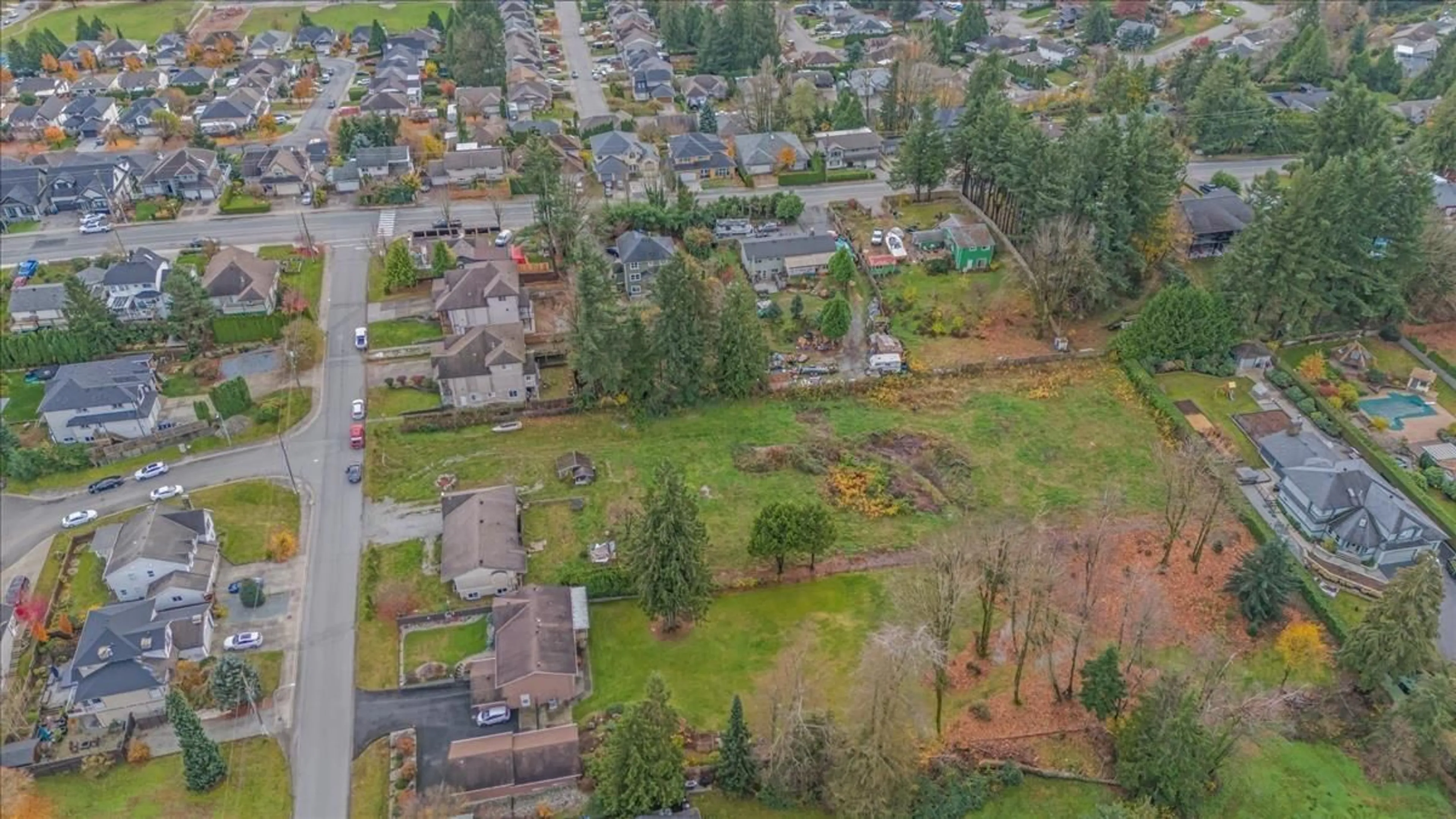 Frontside or backside of a home, the fenced backyard for 8443 HARMS STREET, Mission British Columbia V2V6E2