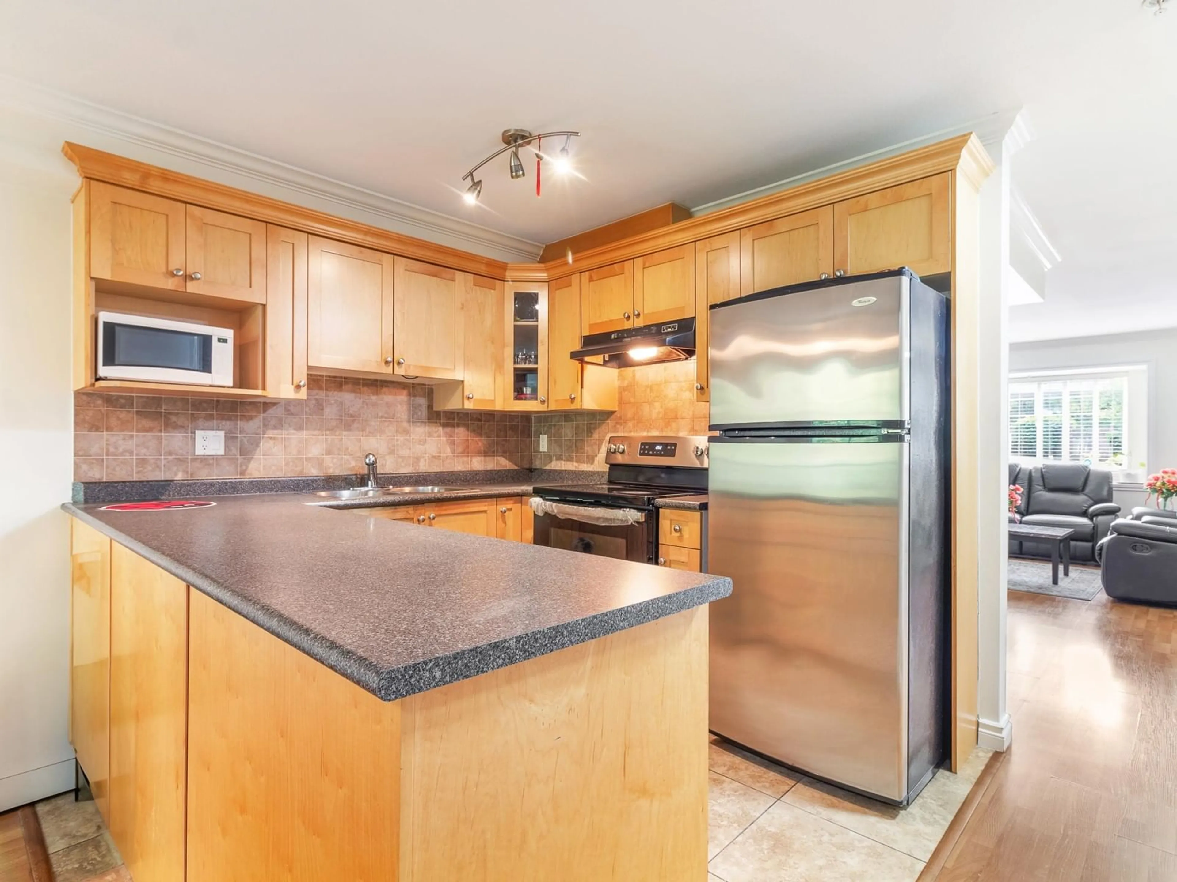 Standard kitchen, wood floors for 30 11255 132 STREET, Surrey British Columbia V3R4R3