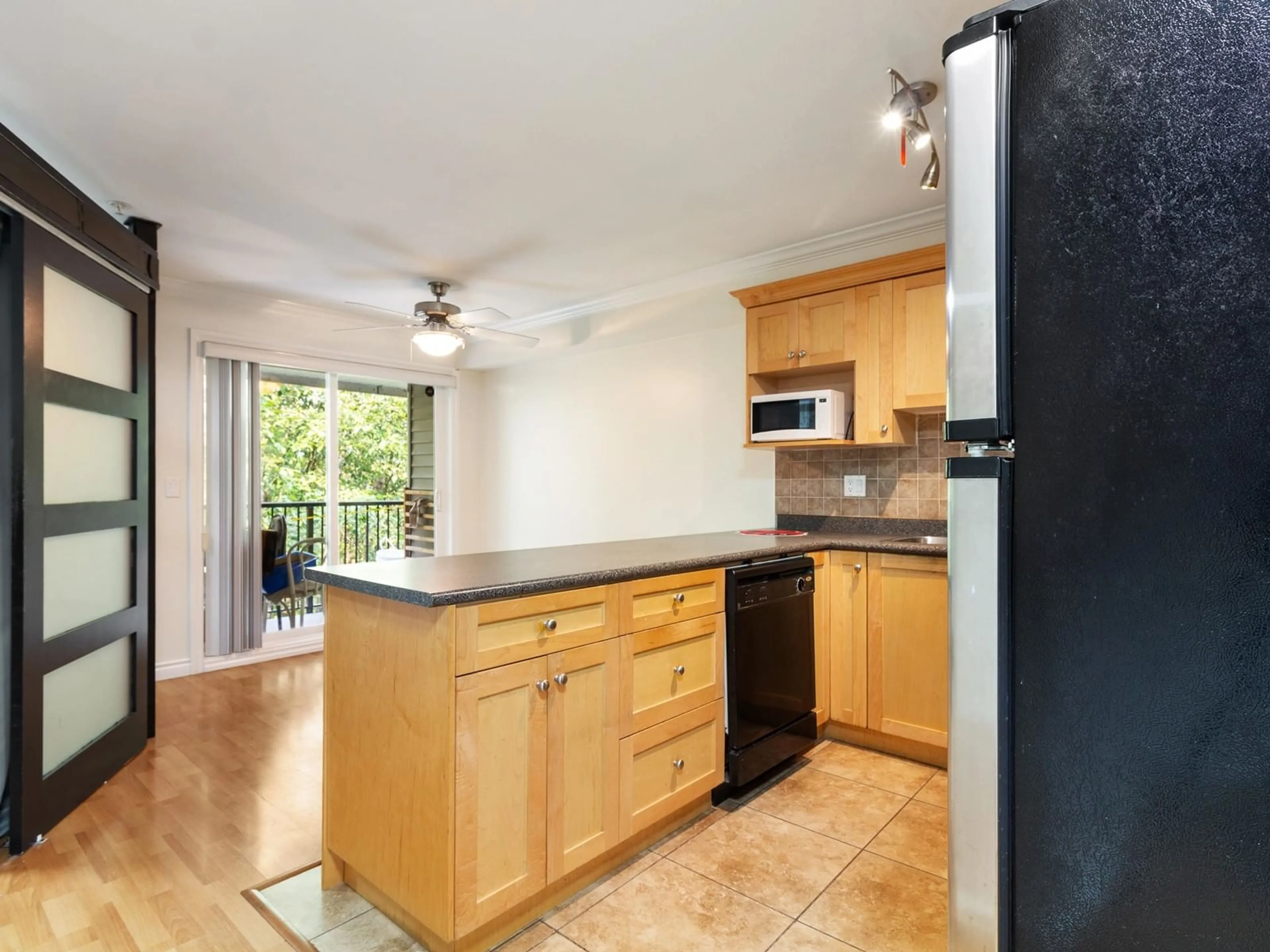 Standard kitchen, wood floors, cottage for 30 11255 132 STREET, Surrey British Columbia V3R4R3