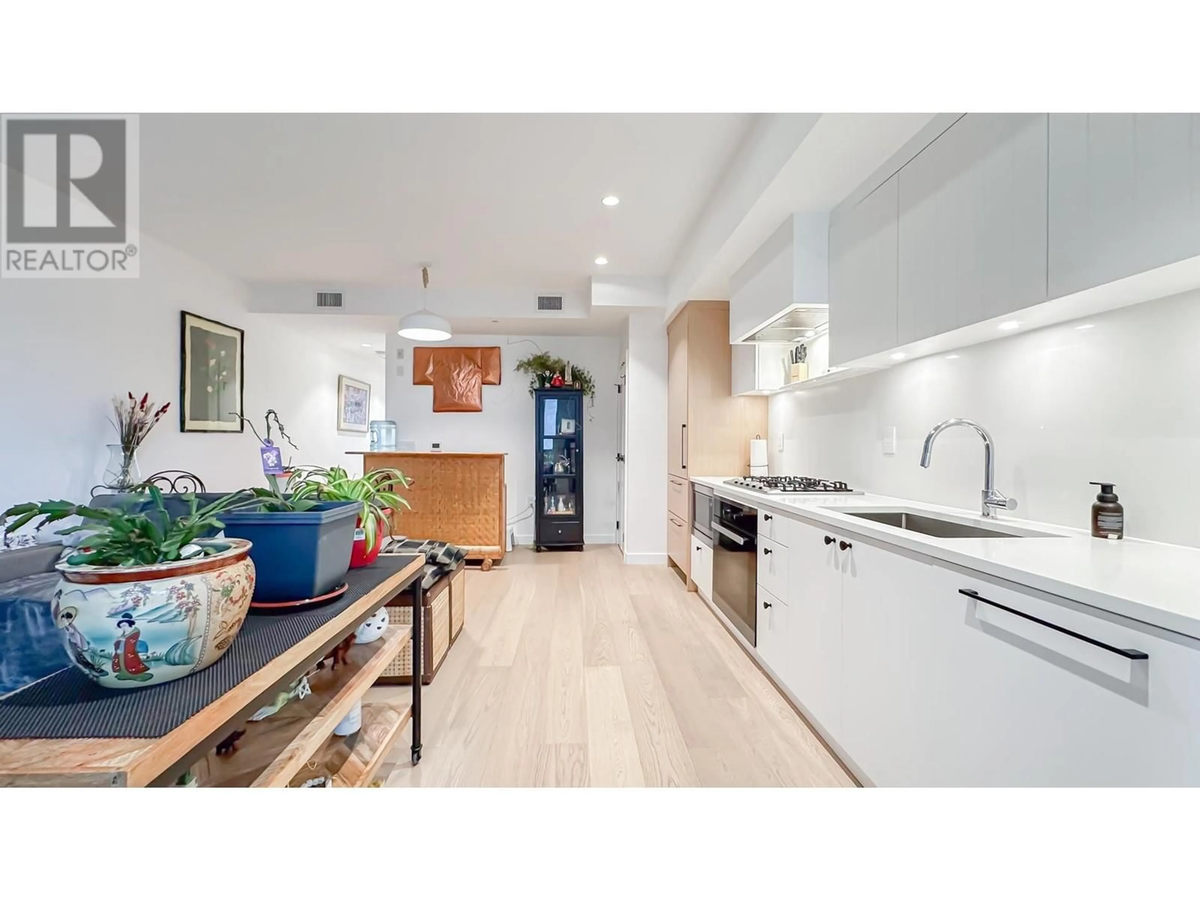 Open concept kitchen for 24 94 W KING EDWARD AVENUE, Vancouver British Columbia V5Y0N6