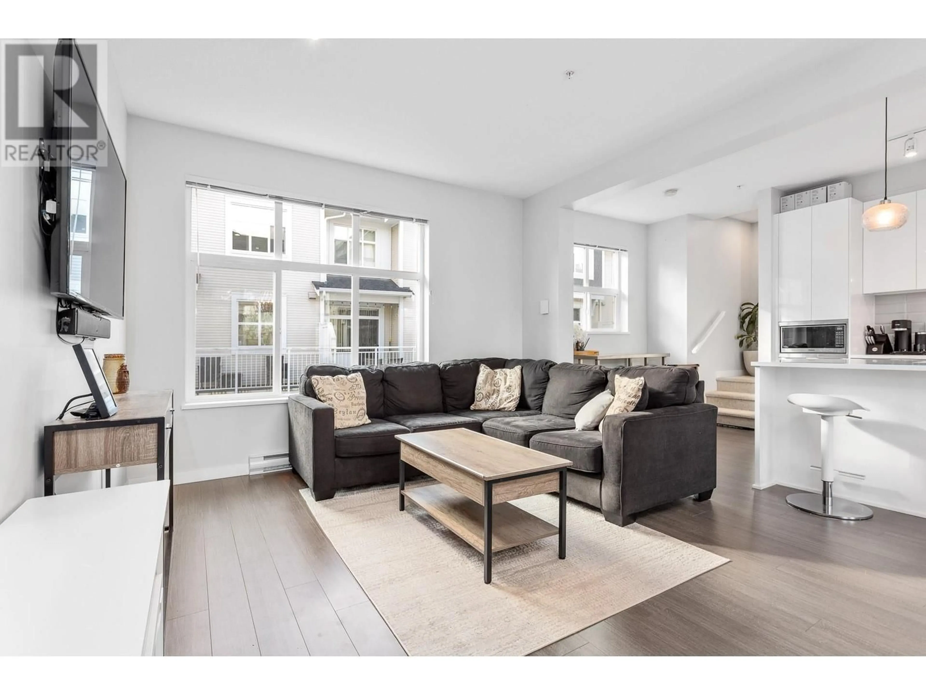 Living room, wood floors for 1203 11295 PAZARENA PLACE, Maple Ridge British Columbia V2X4K9