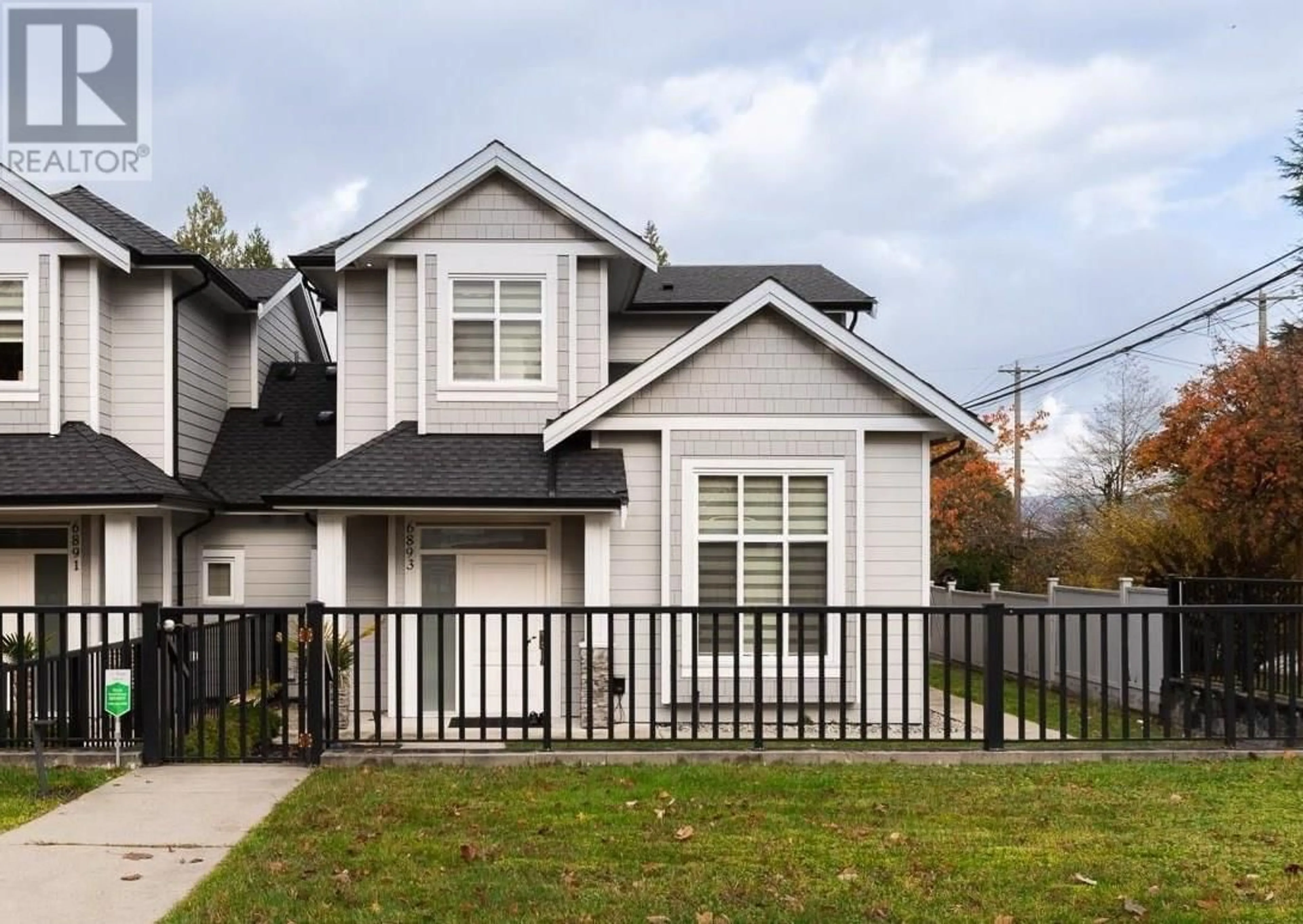 Frontside or backside of a home, the fenced backyard for 6893 BURNS STREET, Burnaby British Columbia V5E1T5