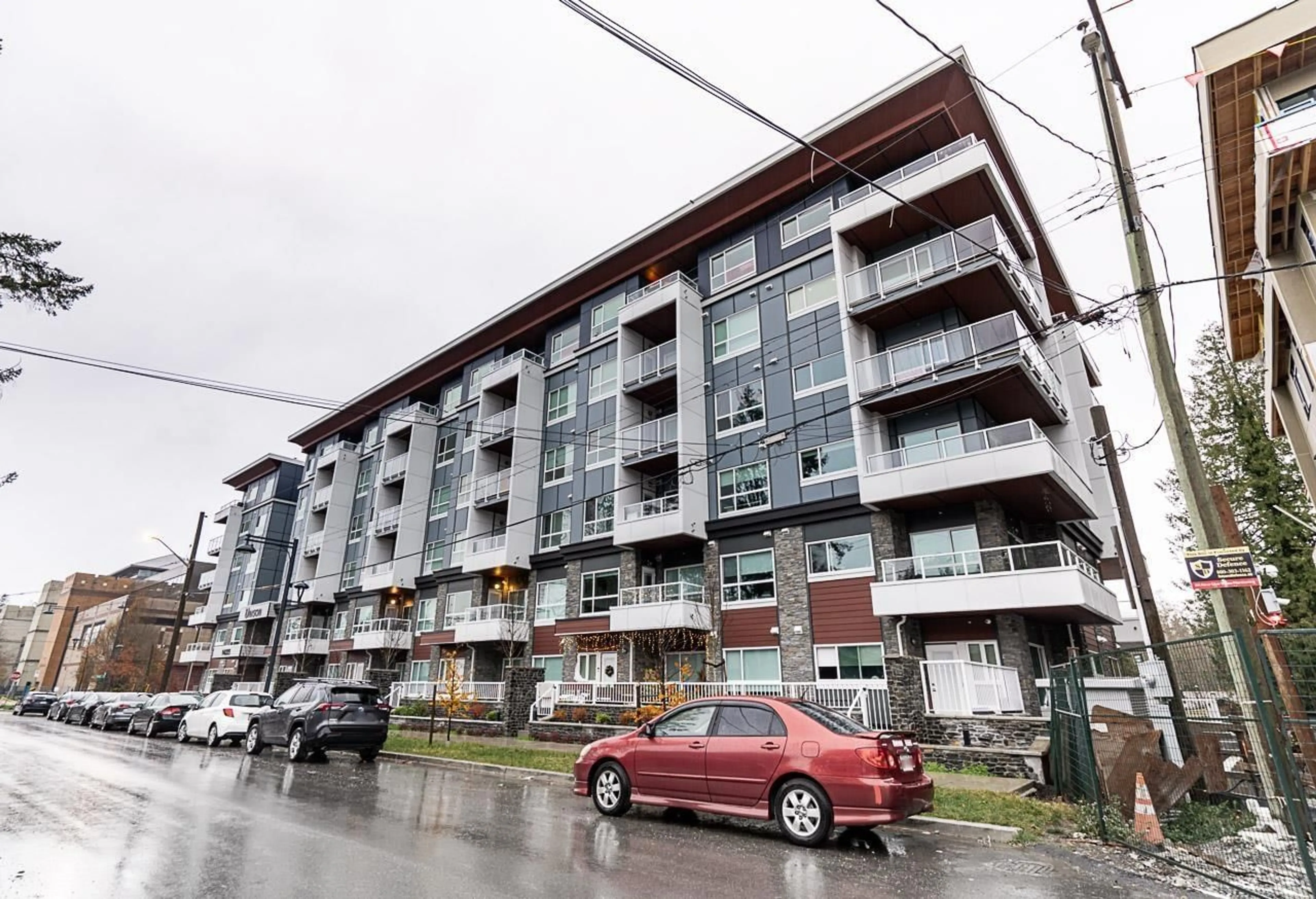 A pic from exterior of the house or condo, the street view for 301 14225 103A AVENUE, Surrey British Columbia V3T0T4