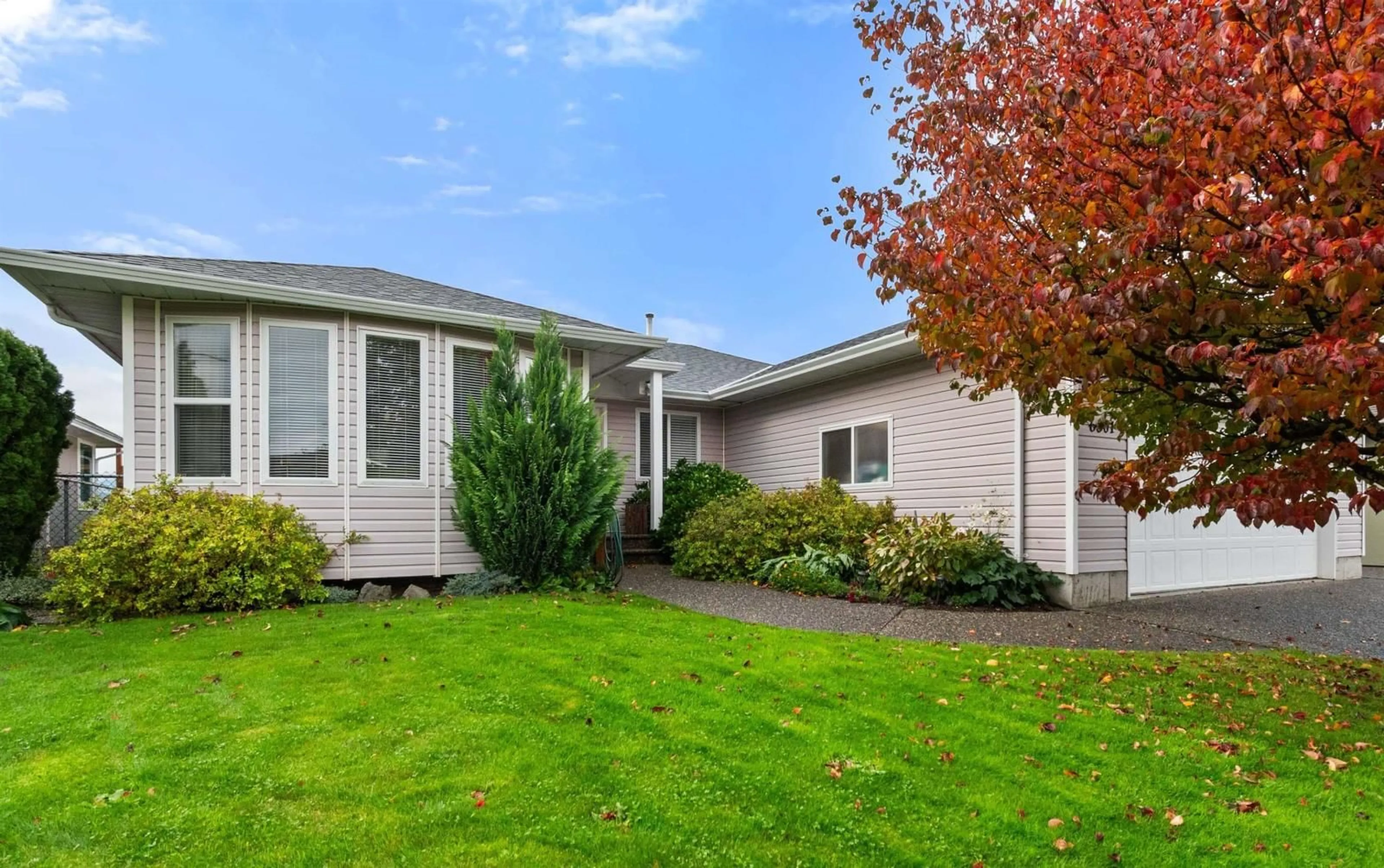 A pic from exterior of the house or condo, the fenced backyard for 6801 WILTSHIRE STREET, Chilliwack British Columbia V2R2Z3