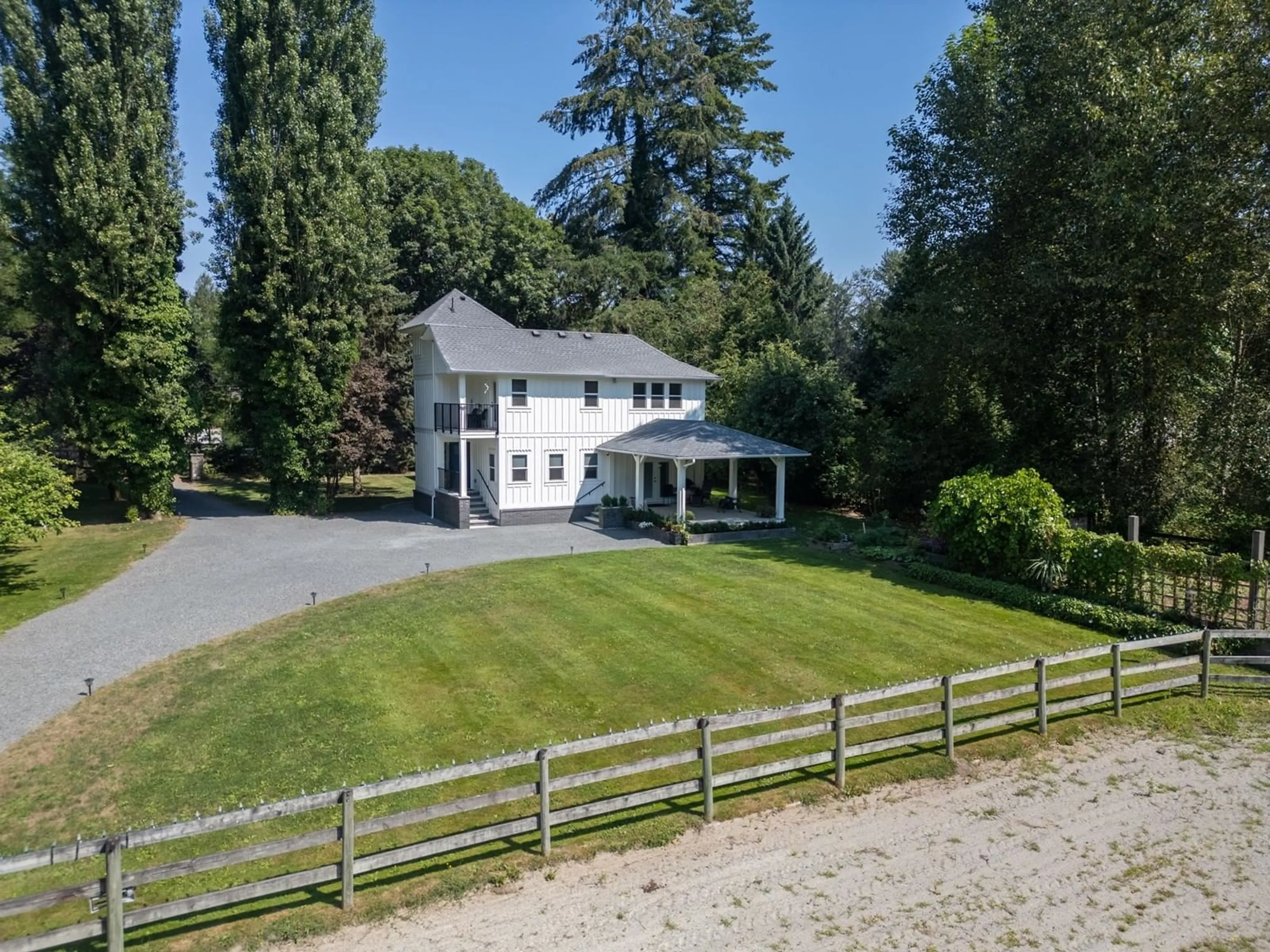 Frontside or backside of a home, the fenced backyard for 21834 40 AVENUE, Langley British Columbia V2Z1N7