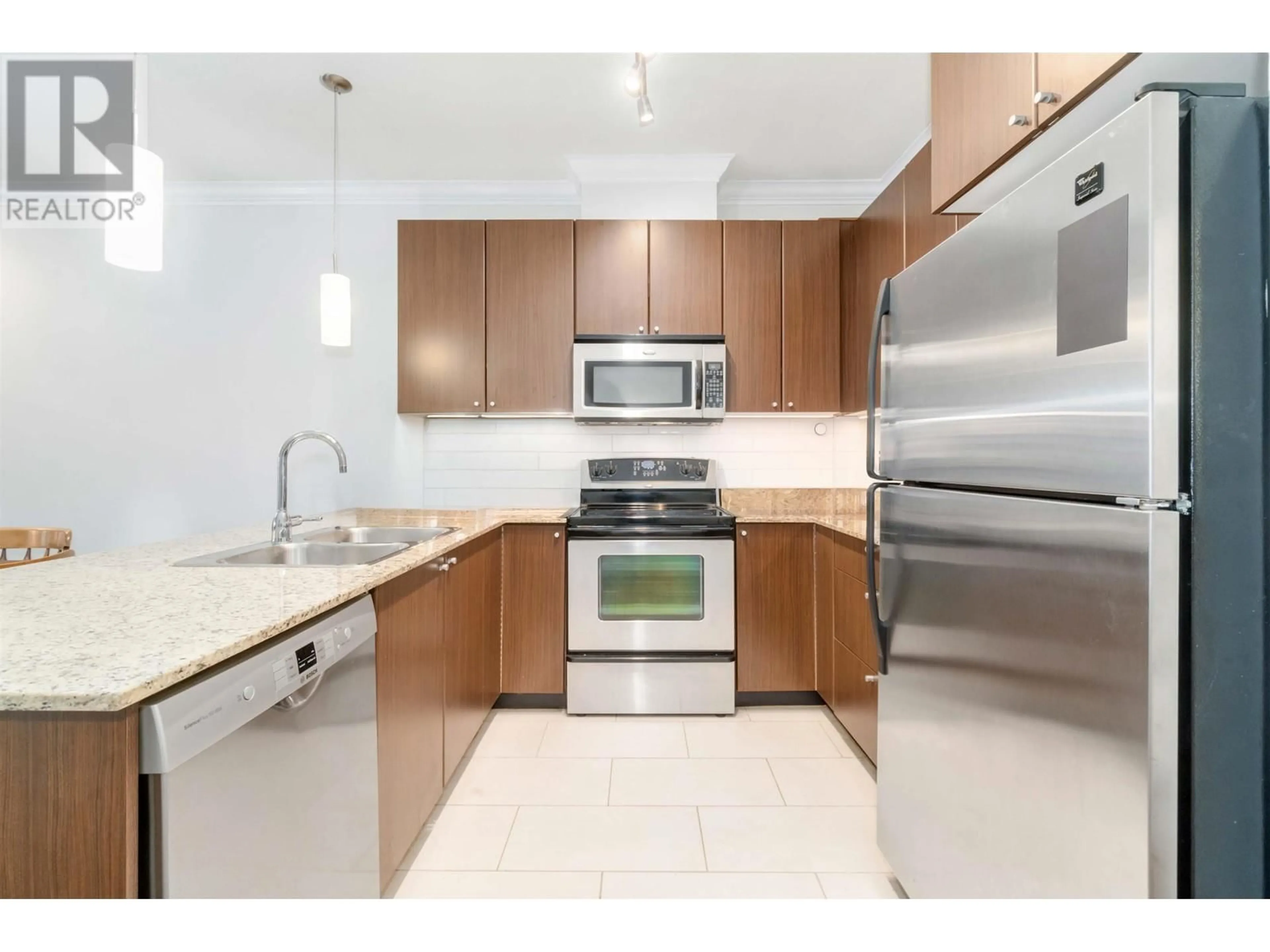 Standard kitchen, wood floors for 302 2484 WILSON AVENUE, Port Coquitlam British Columbia V3C0A5