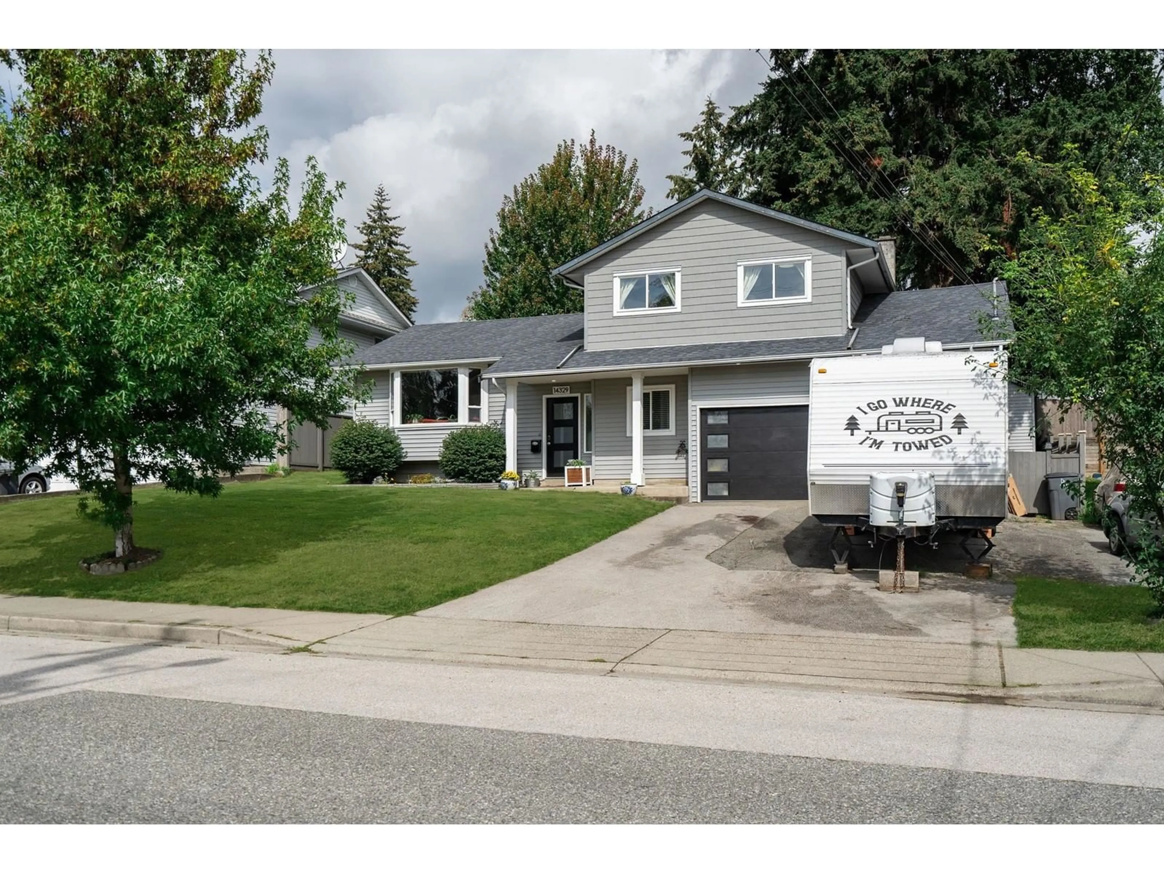 Frontside or backside of a home, the street view for 14329 68 AVENUE, Surrey British Columbia V3W2H5