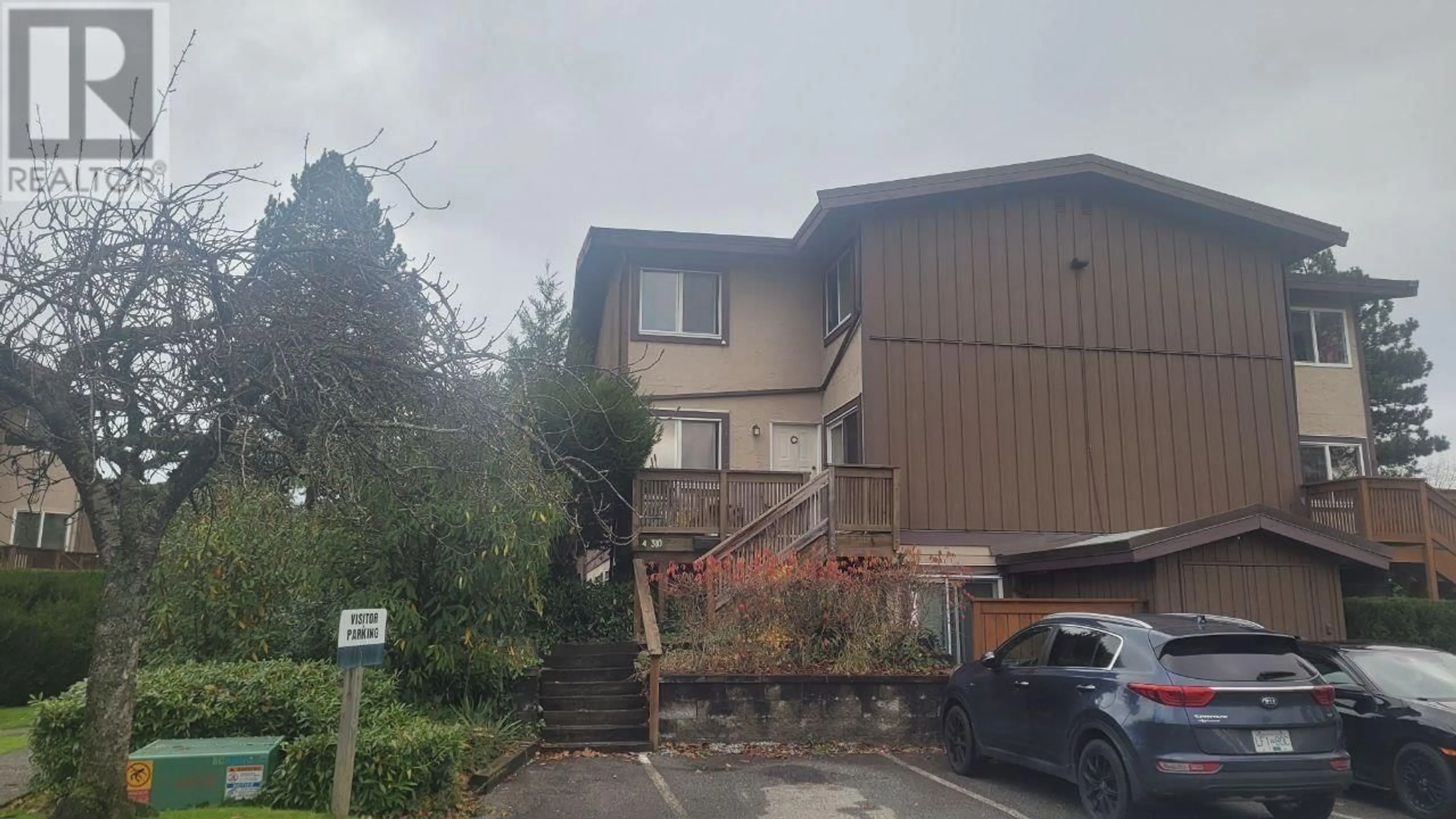 A pic from exterior of the house or condo, the street view for 4 310 HIGHLAND WAY, Port Moody British Columbia V3H3V7