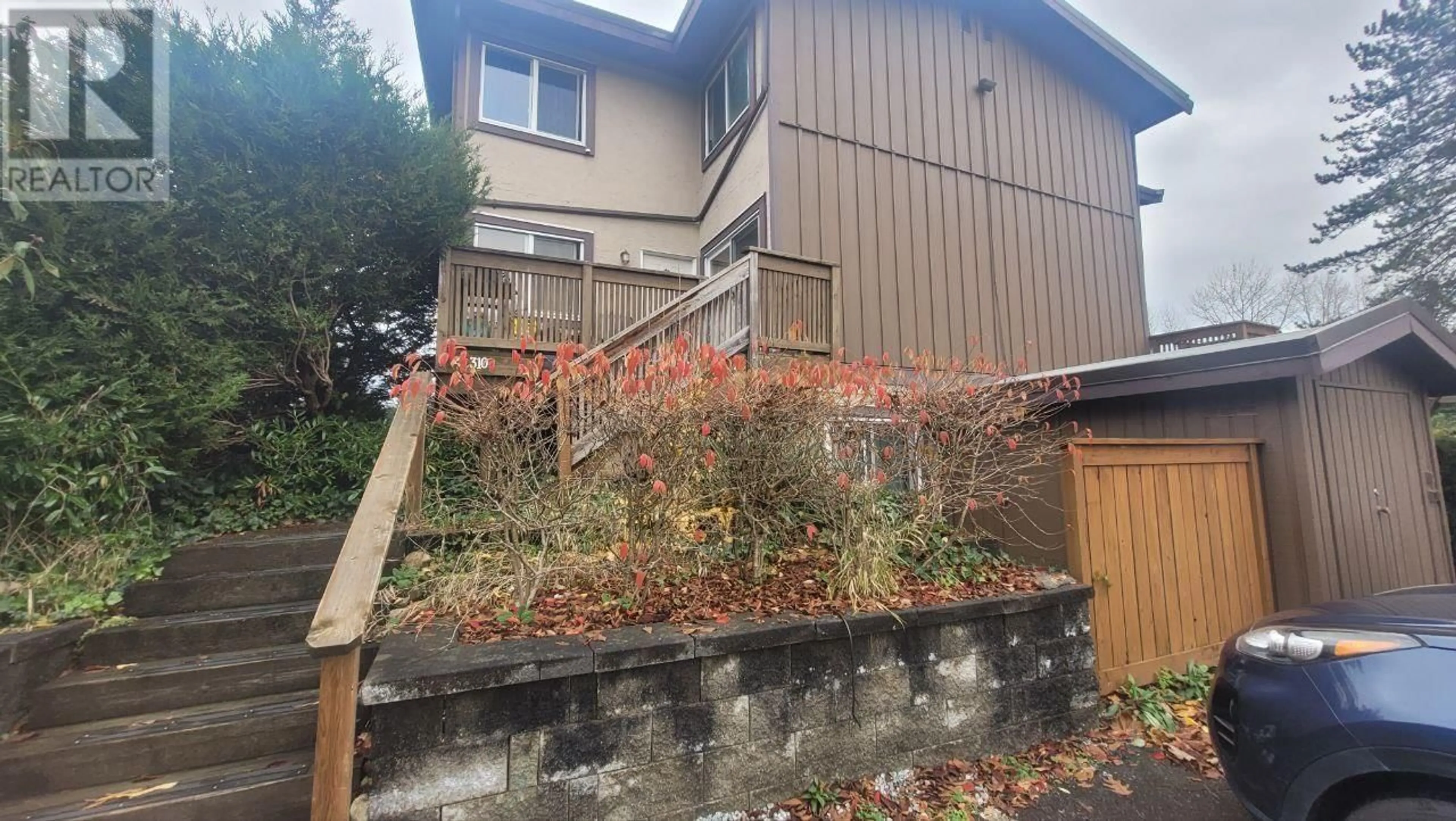 A pic from exterior of the house or condo, the fenced backyard for 4 310 HIGHLAND WAY, Port Moody British Columbia V3H3V7