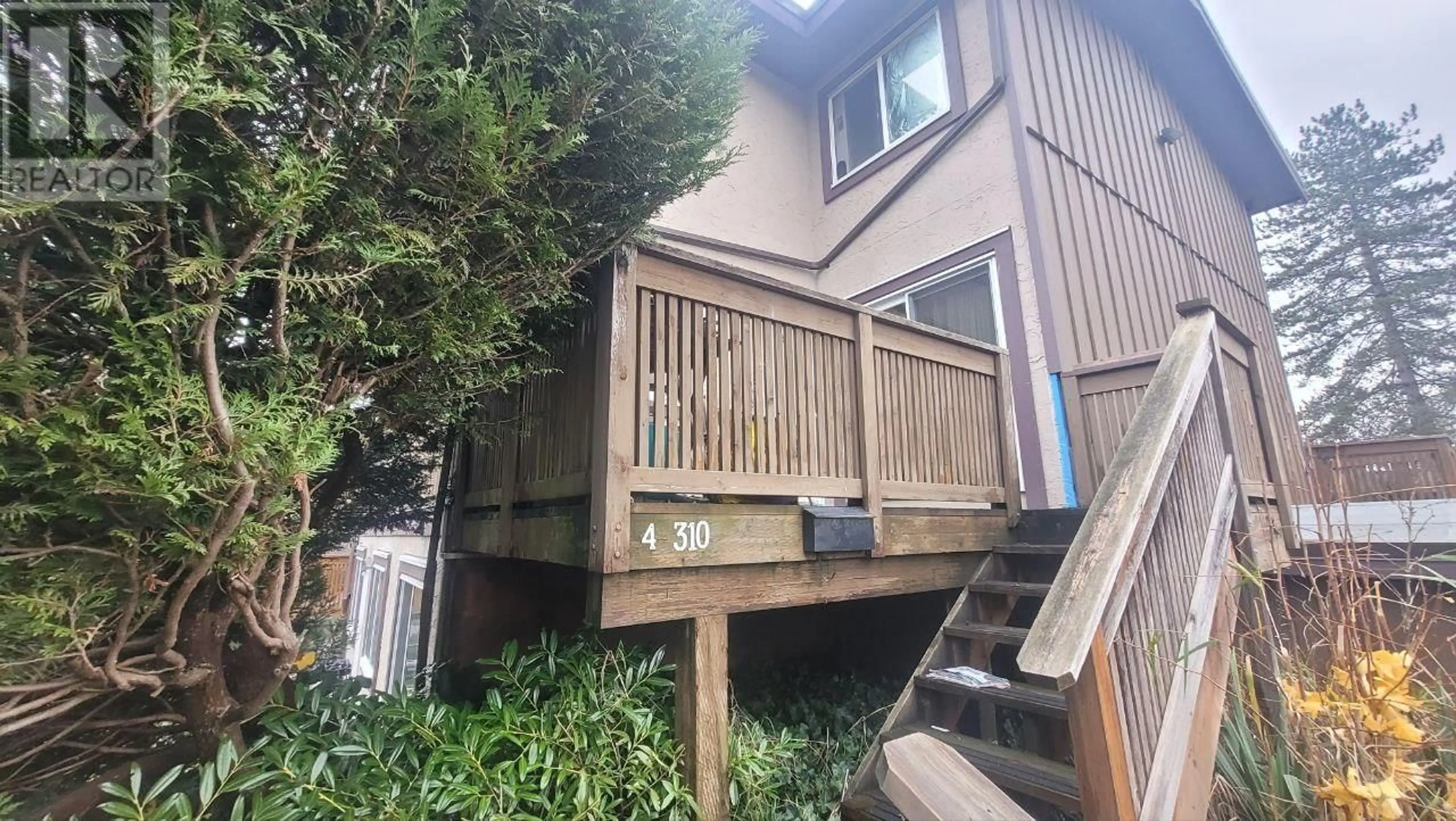 A pic from exterior of the house or condo, the fenced backyard for 4 310 HIGHLAND WAY, Port Moody British Columbia V3H3V7