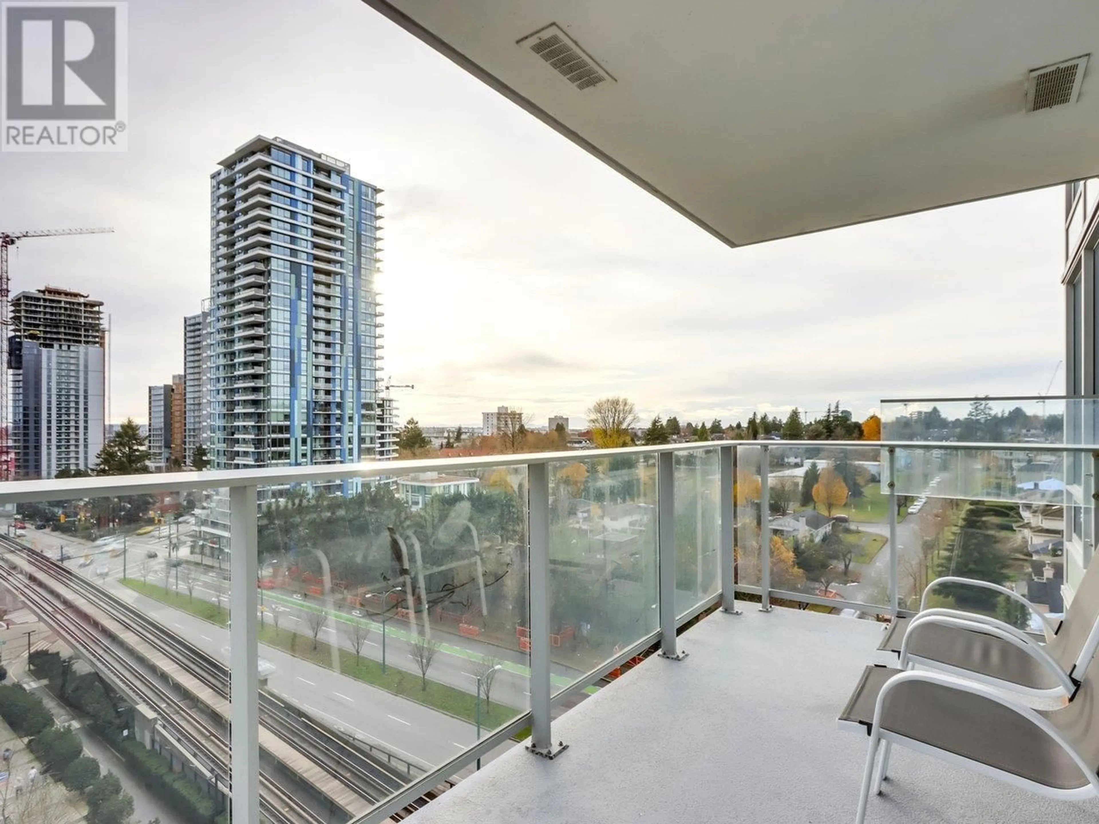 Balcony in the apartment, the view of city buildings for 1008 8031 NUNAVUT LANE, Vancouver British Columbia V5X0C9