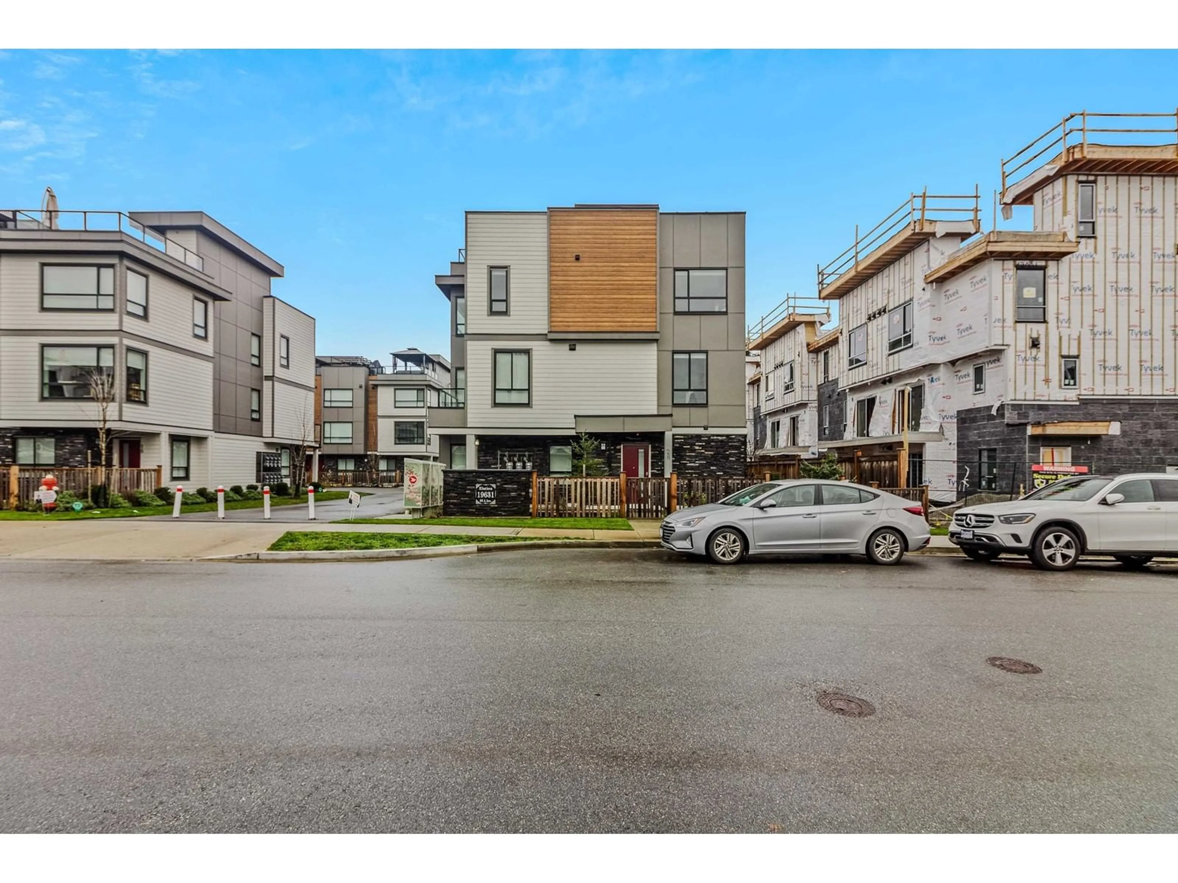 A pic from exterior of the house or condo, the street view for 28 19631 55A AVENUE, Langley British Columbia V3A0L5