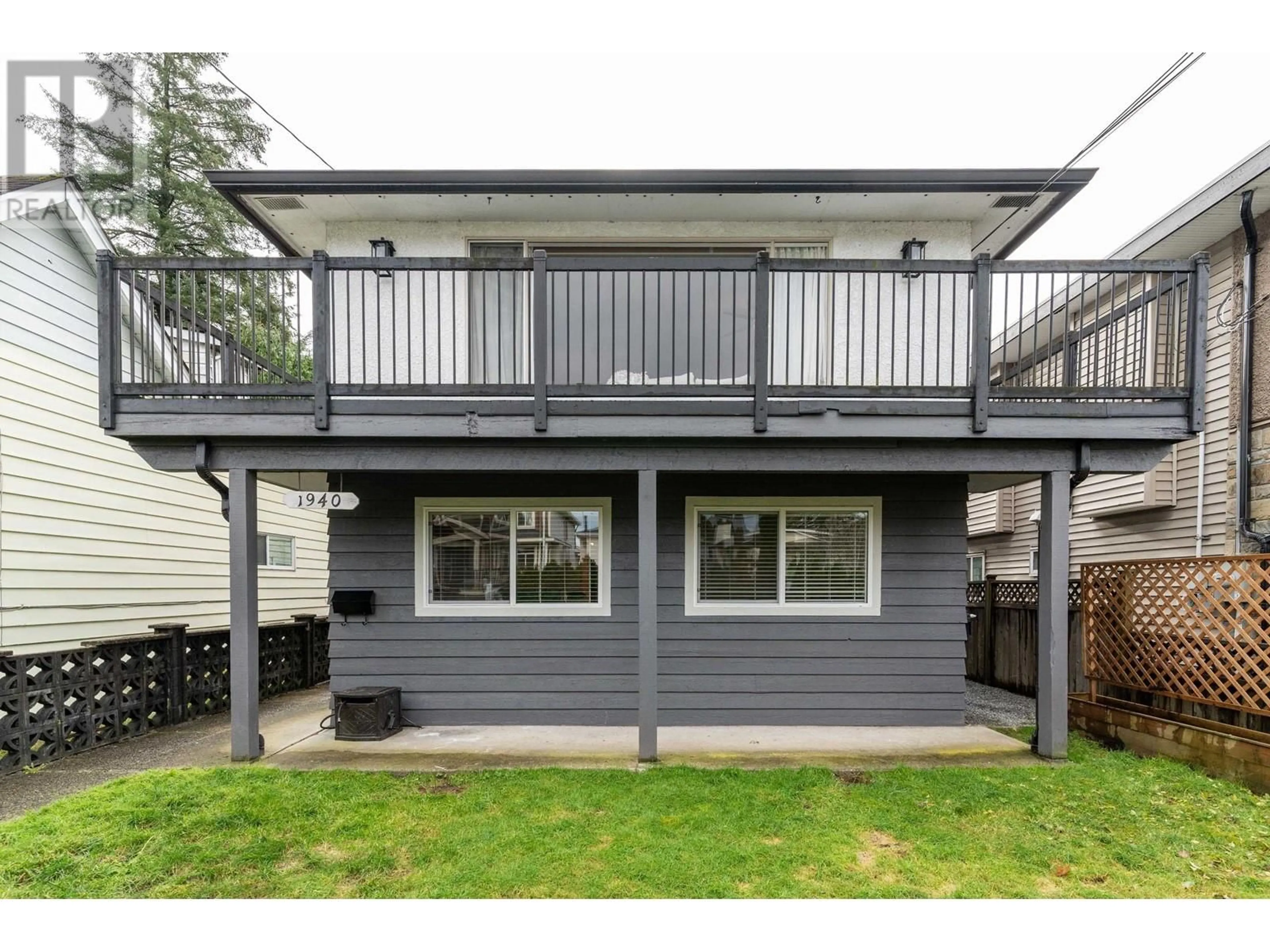 Frontside or backside of a home, the fenced backyard for 1940 FRASER AVENUE, Port Coquitlam British Columbia V3B1N3