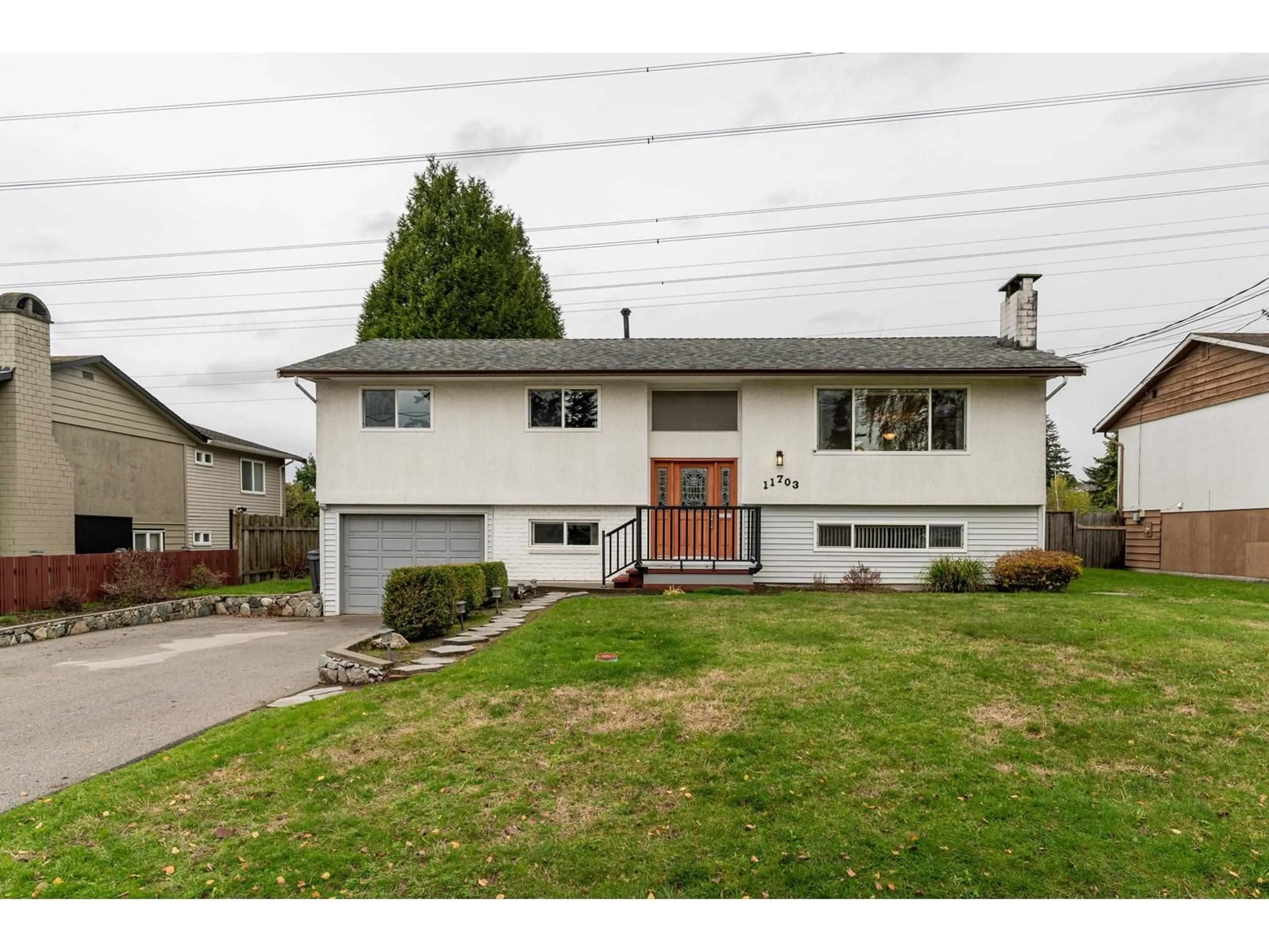 Frontside or backside of a home, the street view for 11703 73A AVENUE, Delta British Columbia V4C1C7