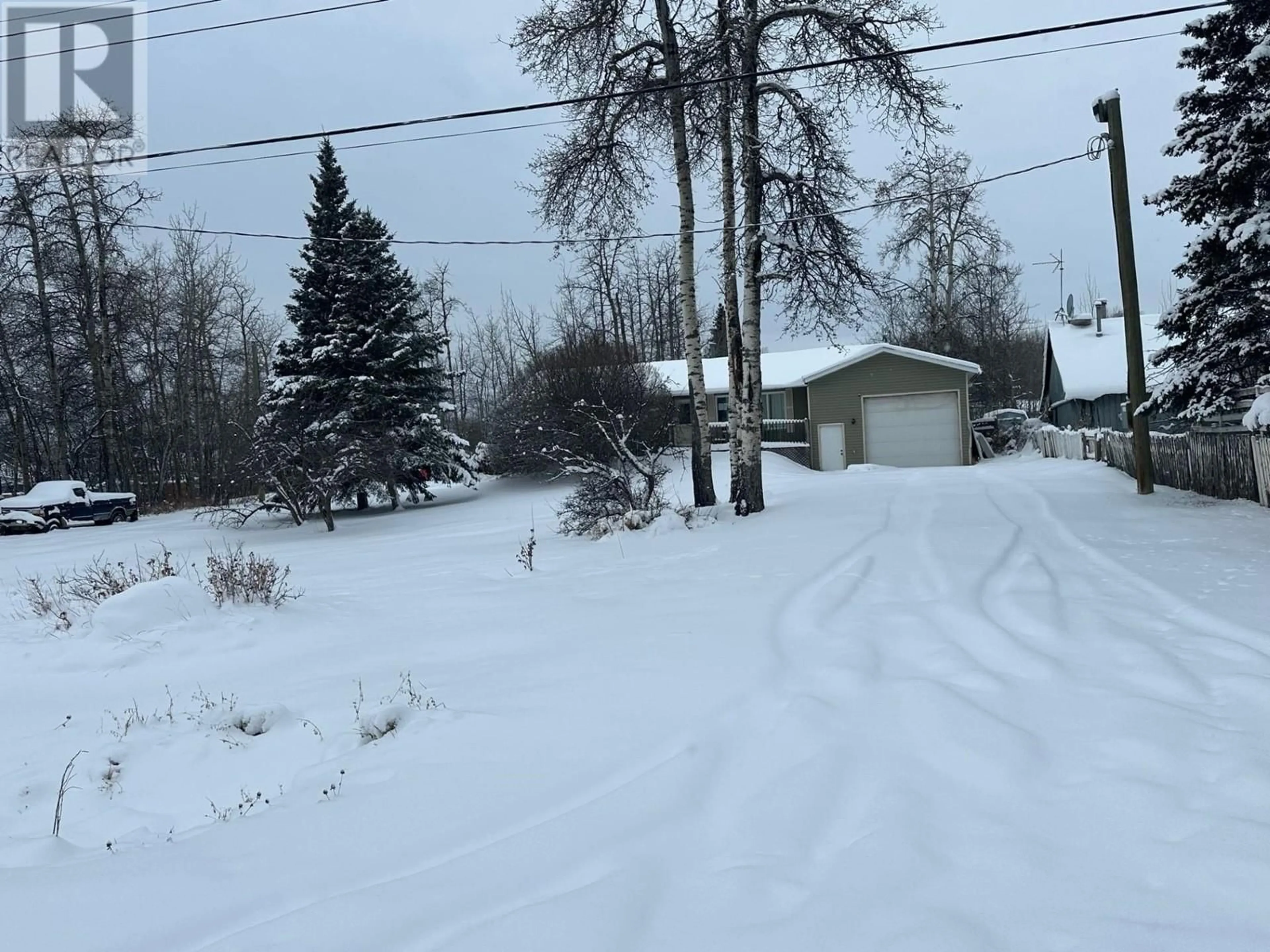 A pic from outside/outdoor area/front of a property/back of a property/a pic from drone, street for 9707 WILLOW ROAD, Fort St. John British Columbia V1J8A5