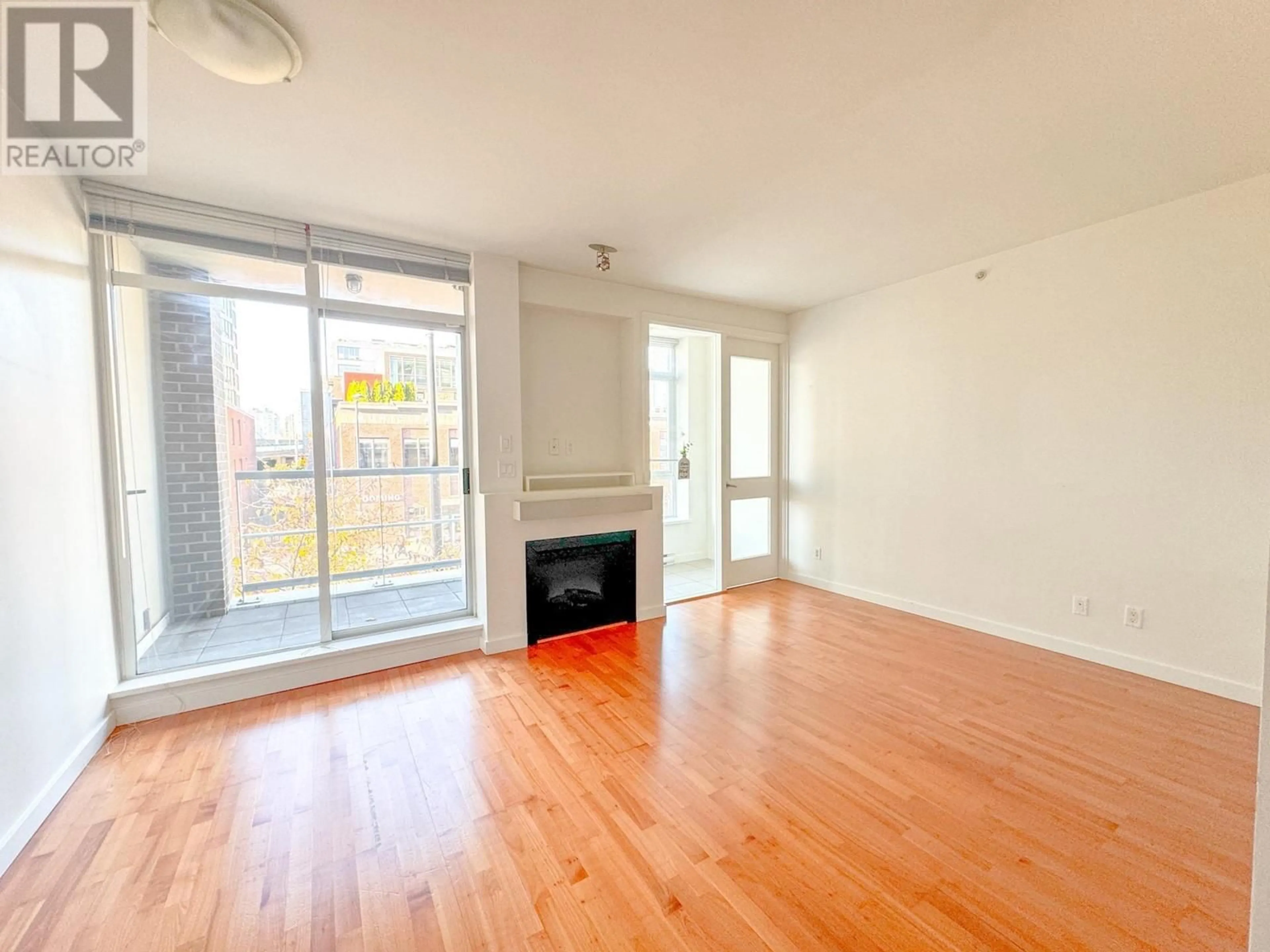 A pic of a room, wood floors for 206 2055 YUKON STREET, Vancouver British Columbia V5Y4B7