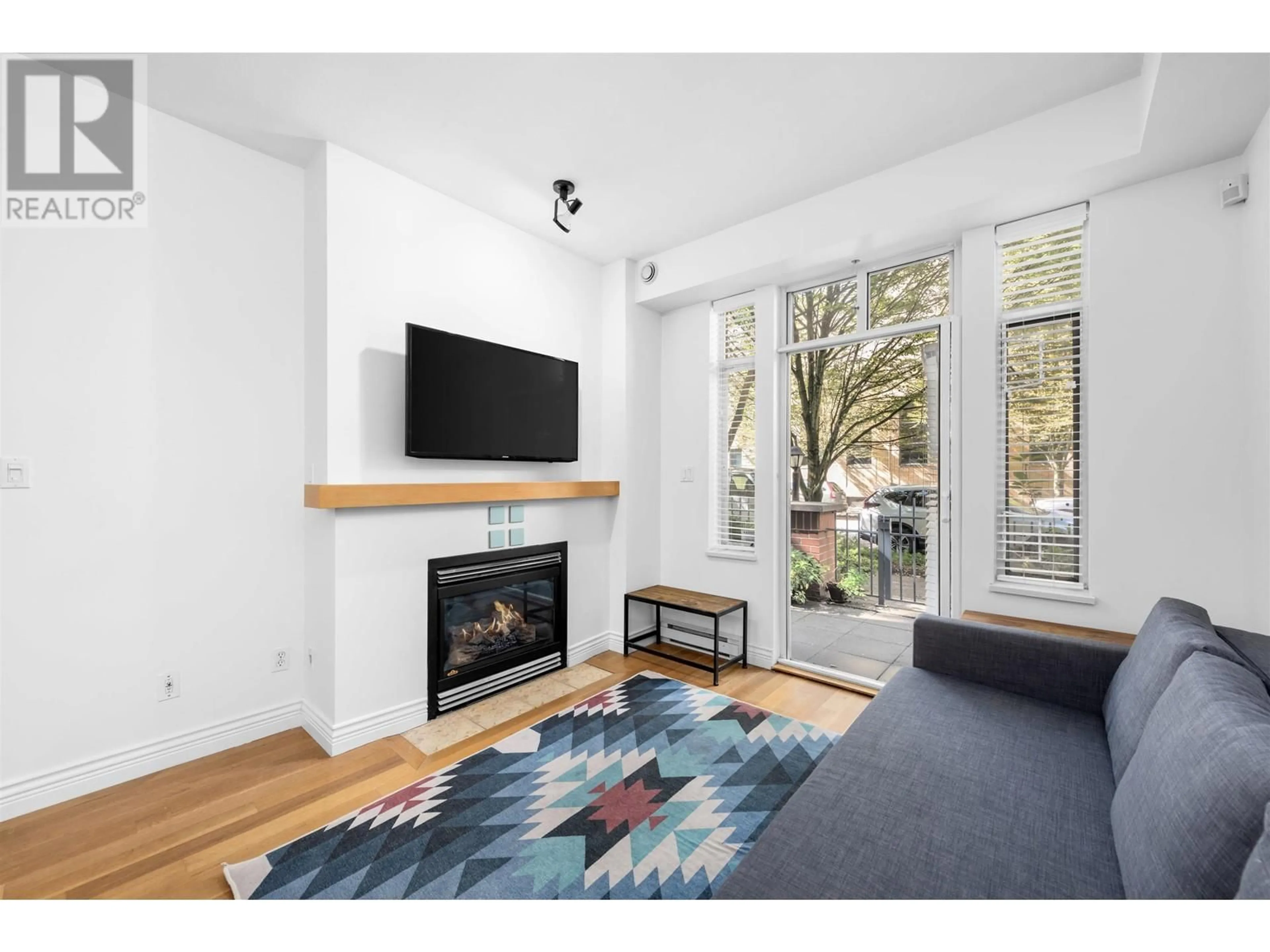 Living room, wood floors for 116 2628 YEW STREET, Vancouver British Columbia V6K4T4