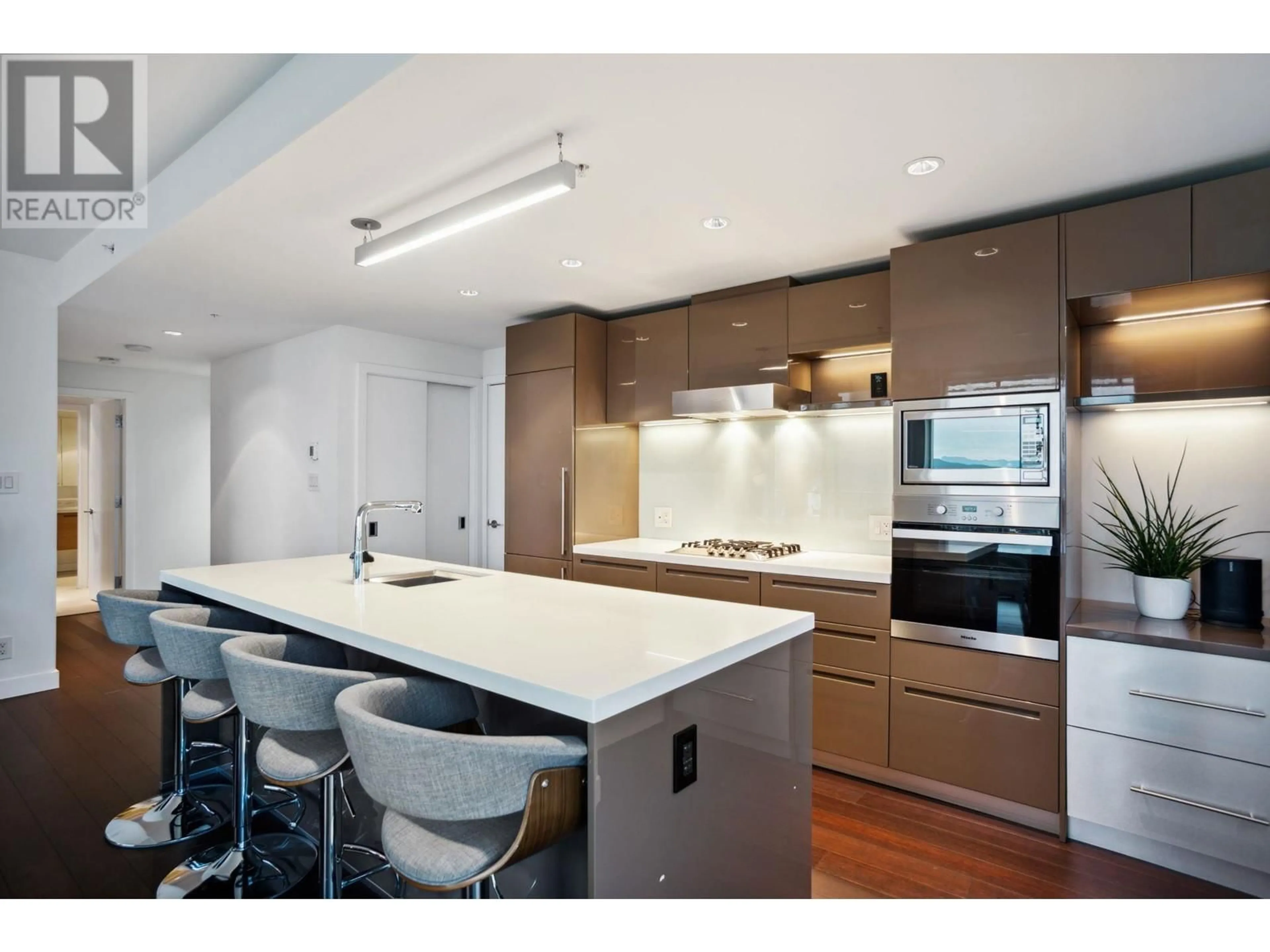 Contemporary kitchen, wood floors for 4102 777 RICHARDS STREET, Vancouver British Columbia V6B0M6