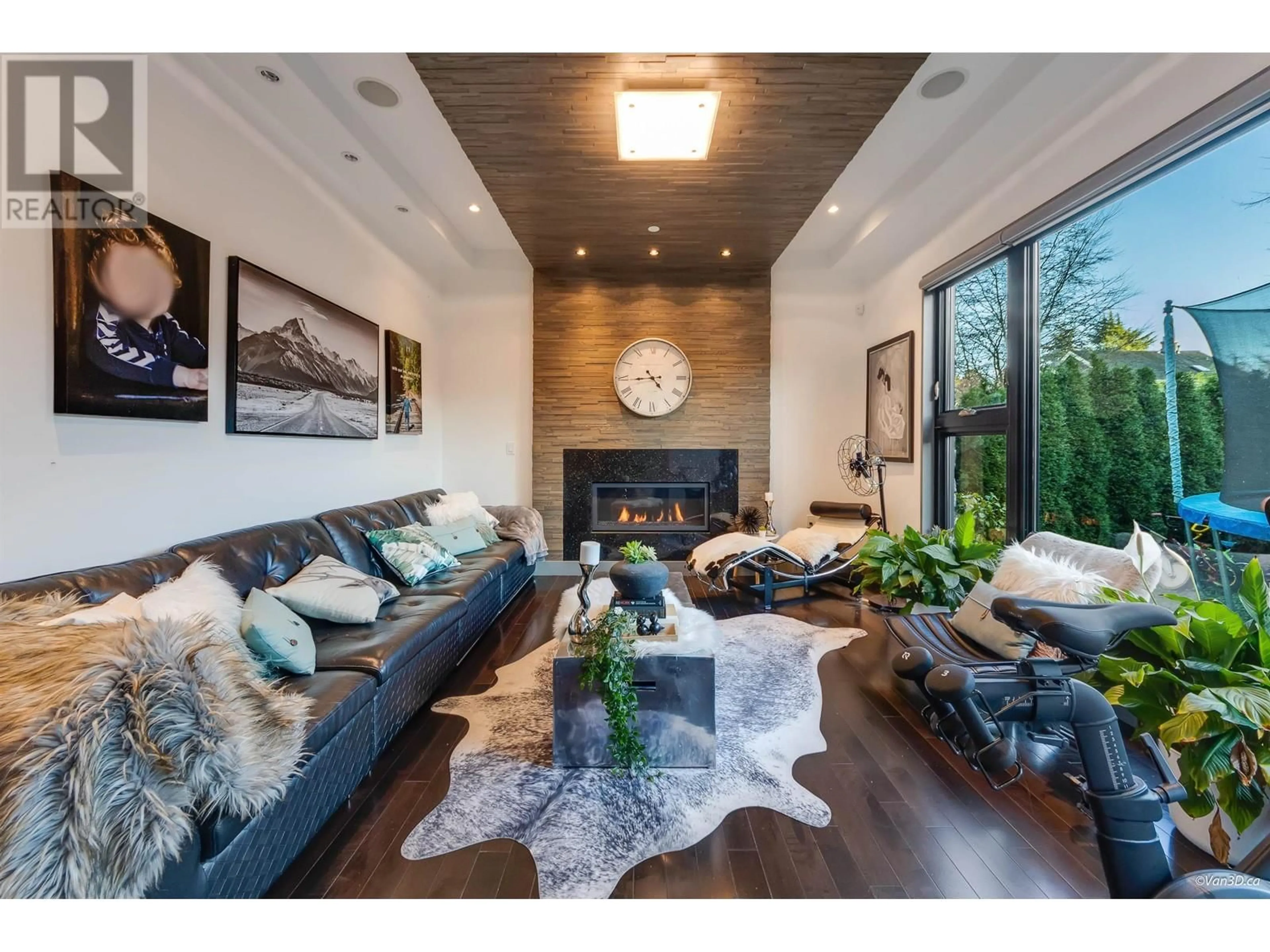 Living room with furniture, wood/laminate floor for 4473 5TH AVENUE, Vancouver British Columbia V6R1S4
