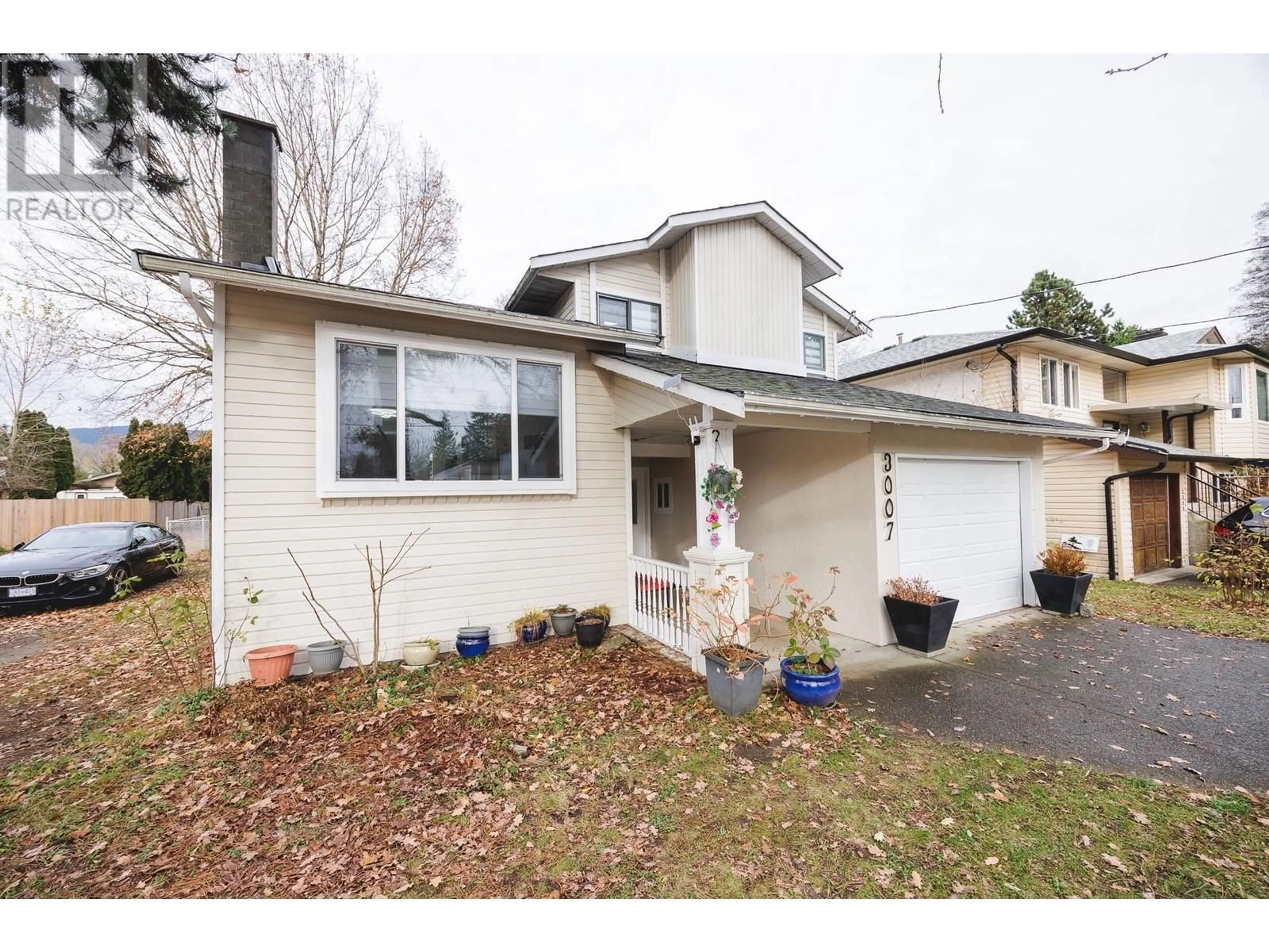 Frontside or backside of a home, cottage for 3007 DEWDNEY TRUNK ROAD, Coquitlam British Columbia V3C2J5