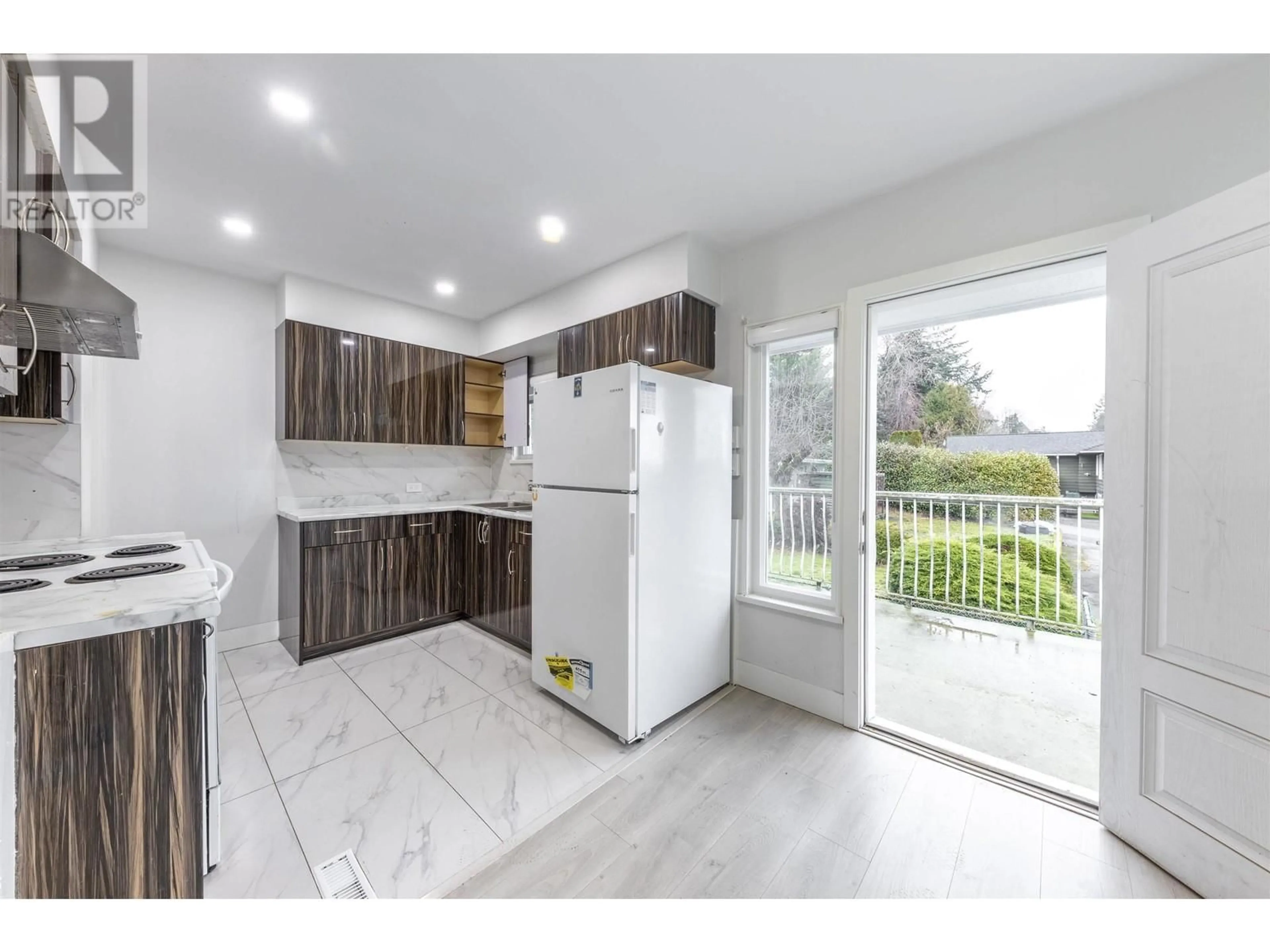 Open concept kitchen for 7850 PATTERSON AVENUE, Burnaby British Columbia V5J3P5